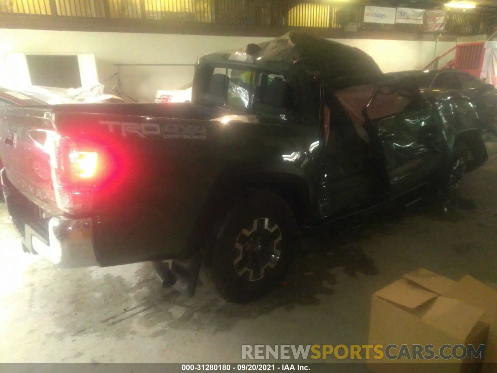 4 Photograph of a damaged car 3TMCZ5AN5MM374889 TOYOTA TACOMA 4WD 2021