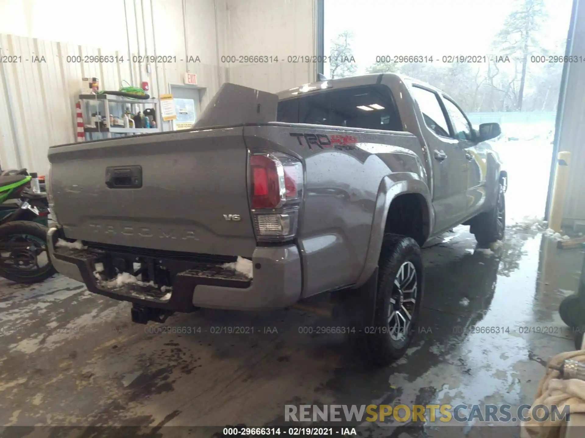 4 Photograph of a damaged car 3TMCZ5AN5MM382054 TOYOTA TACOMA 4WD 2021