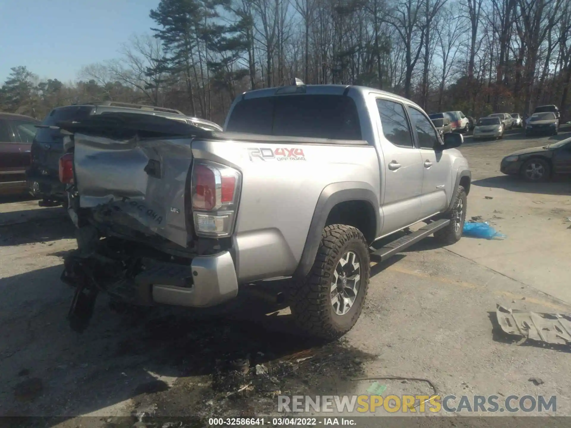 4 Photograph of a damaged car 3TMCZ5AN5MM432323 TOYOTA TACOMA 4WD 2021