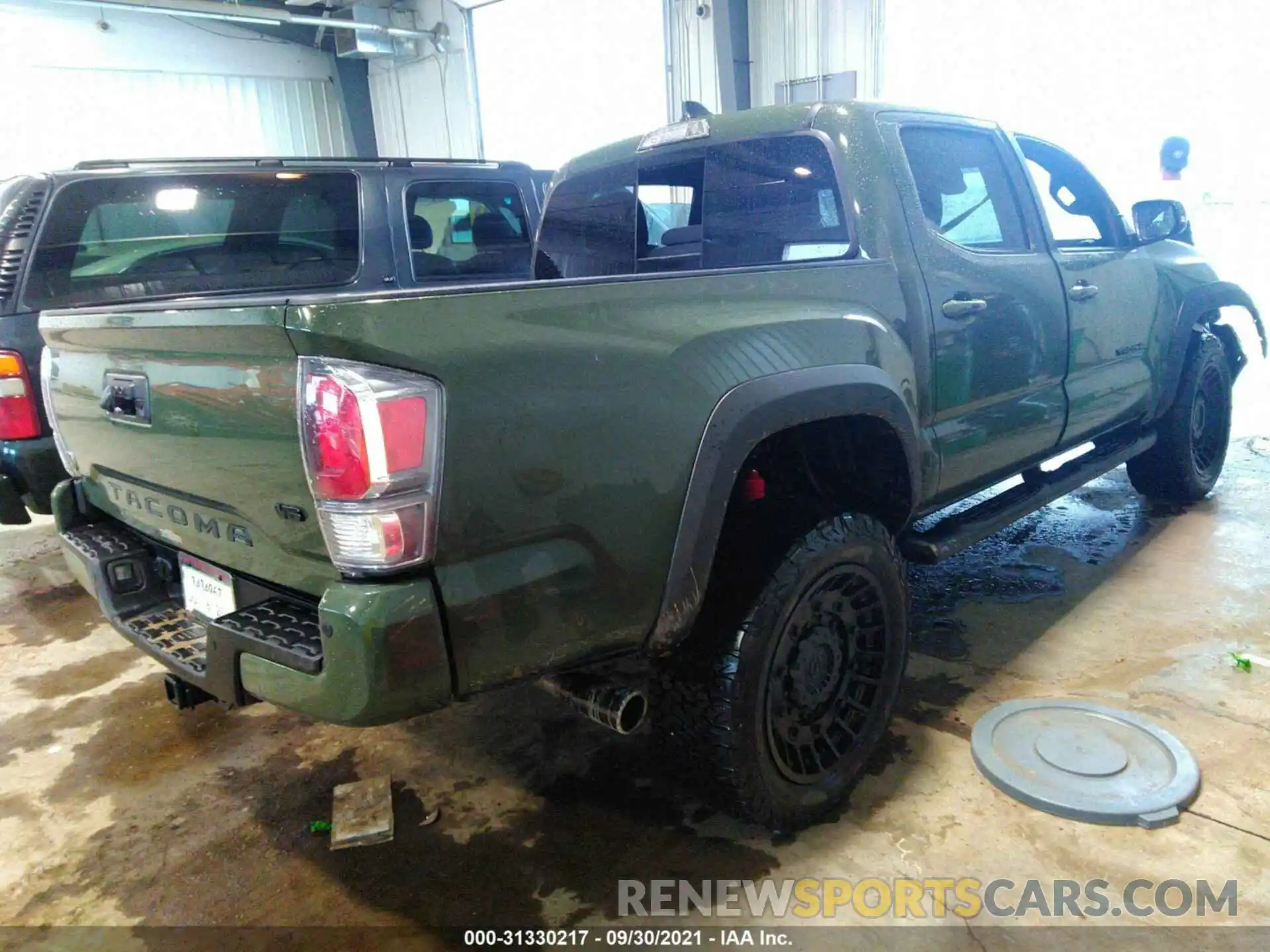 4 Photograph of a damaged car 3TMCZ5AN5MM432841 TOYOTA TACOMA 4WD 2021