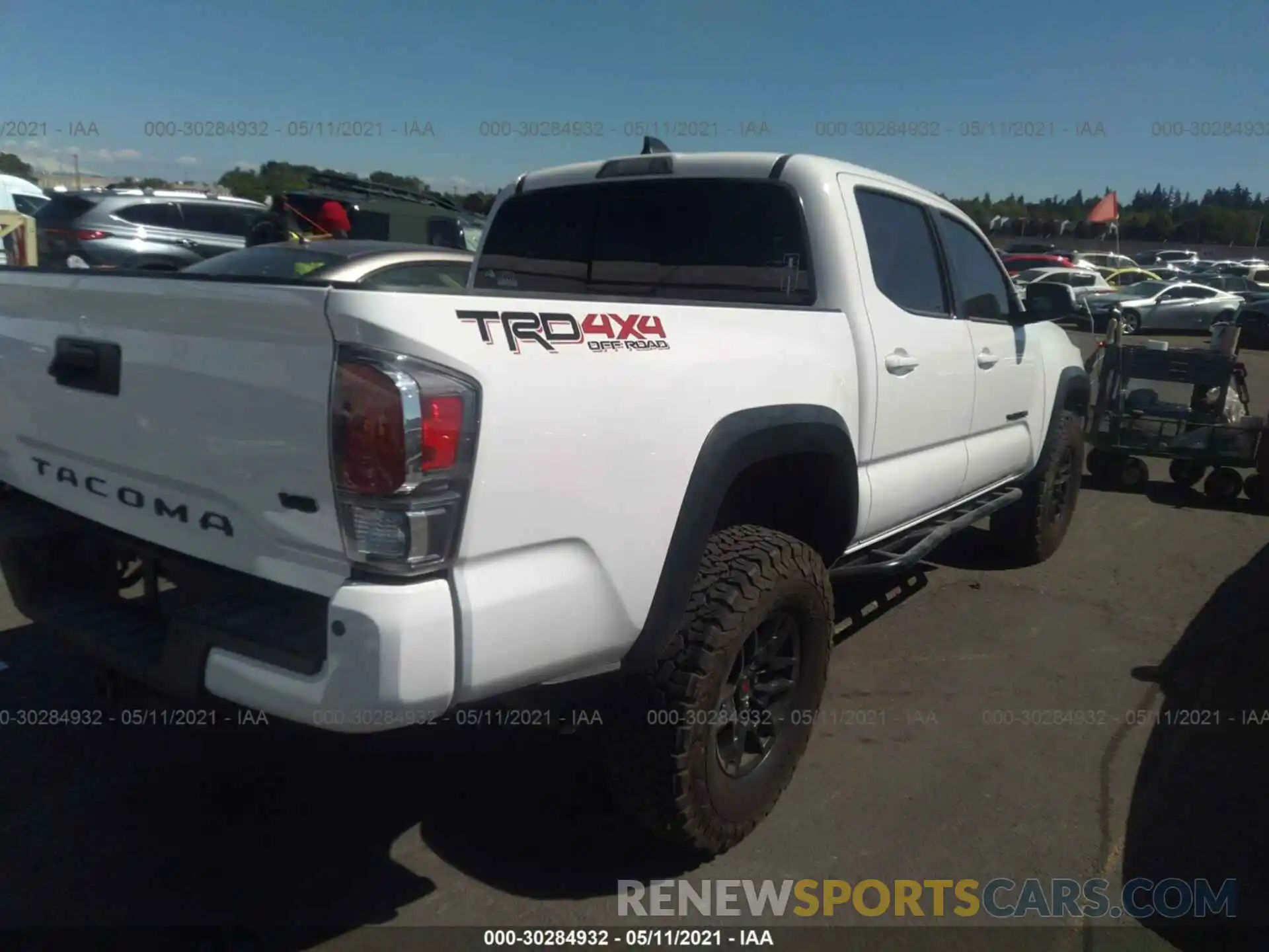 4 Photograph of a damaged car 3TMCZ5AN6MM371564 TOYOTA TACOMA 4WD 2021