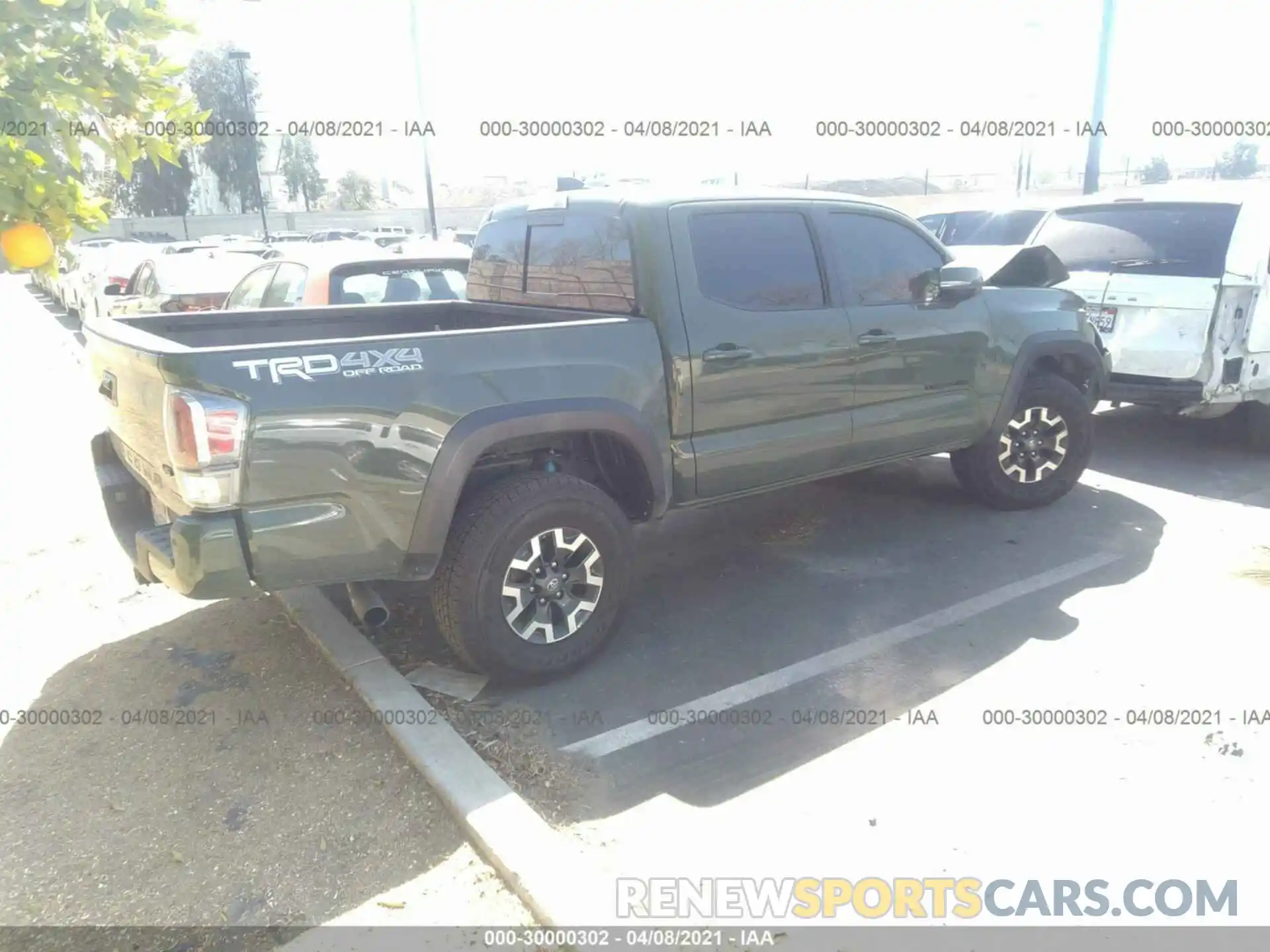 4 Photograph of a damaged car 3TMCZ5AN6MM381026 TOYOTA TACOMA 4WD 2021