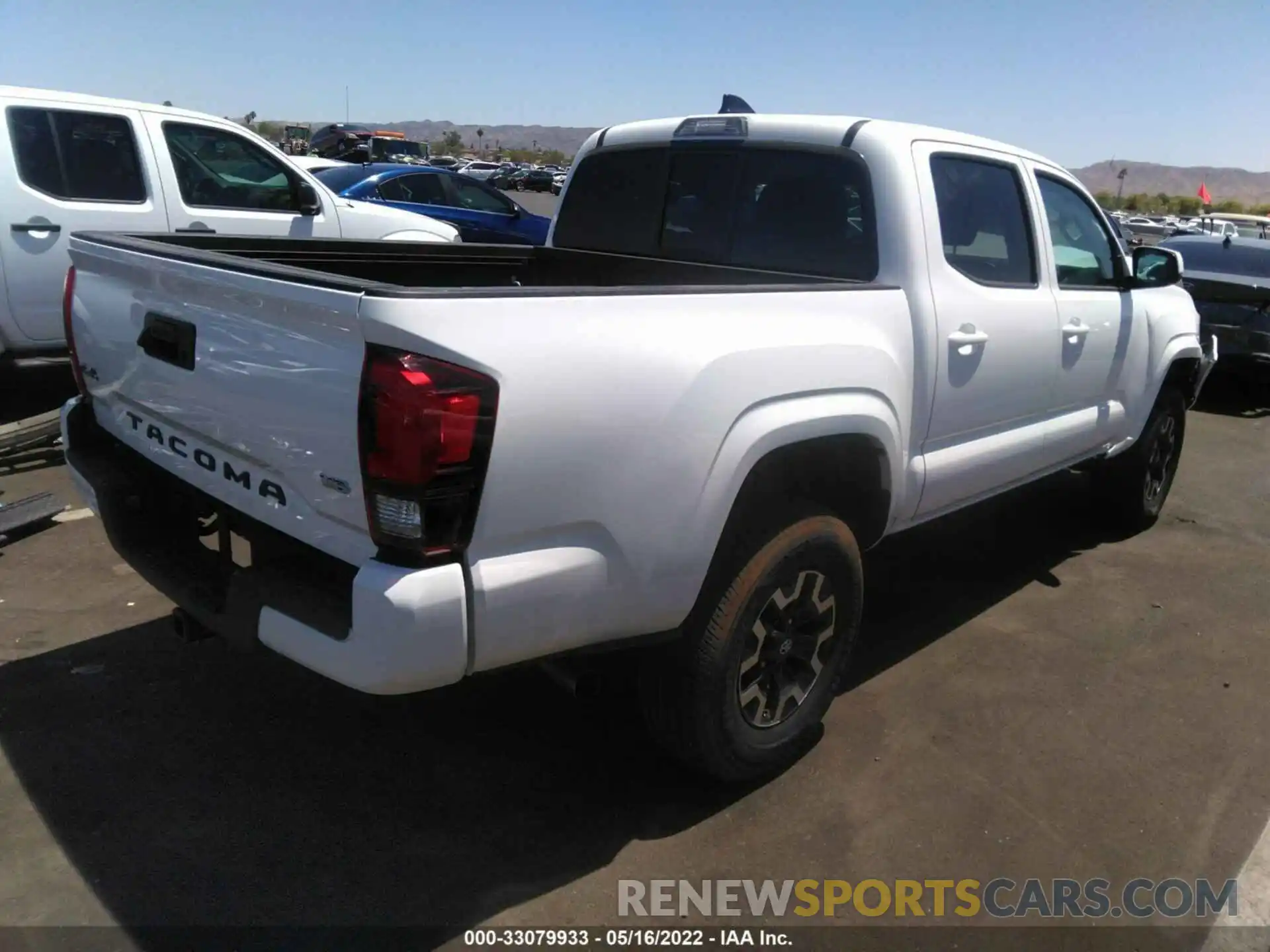 4 Photograph of a damaged car 3TMCZ5AN6MM393709 TOYOTA TACOMA 4WD 2021