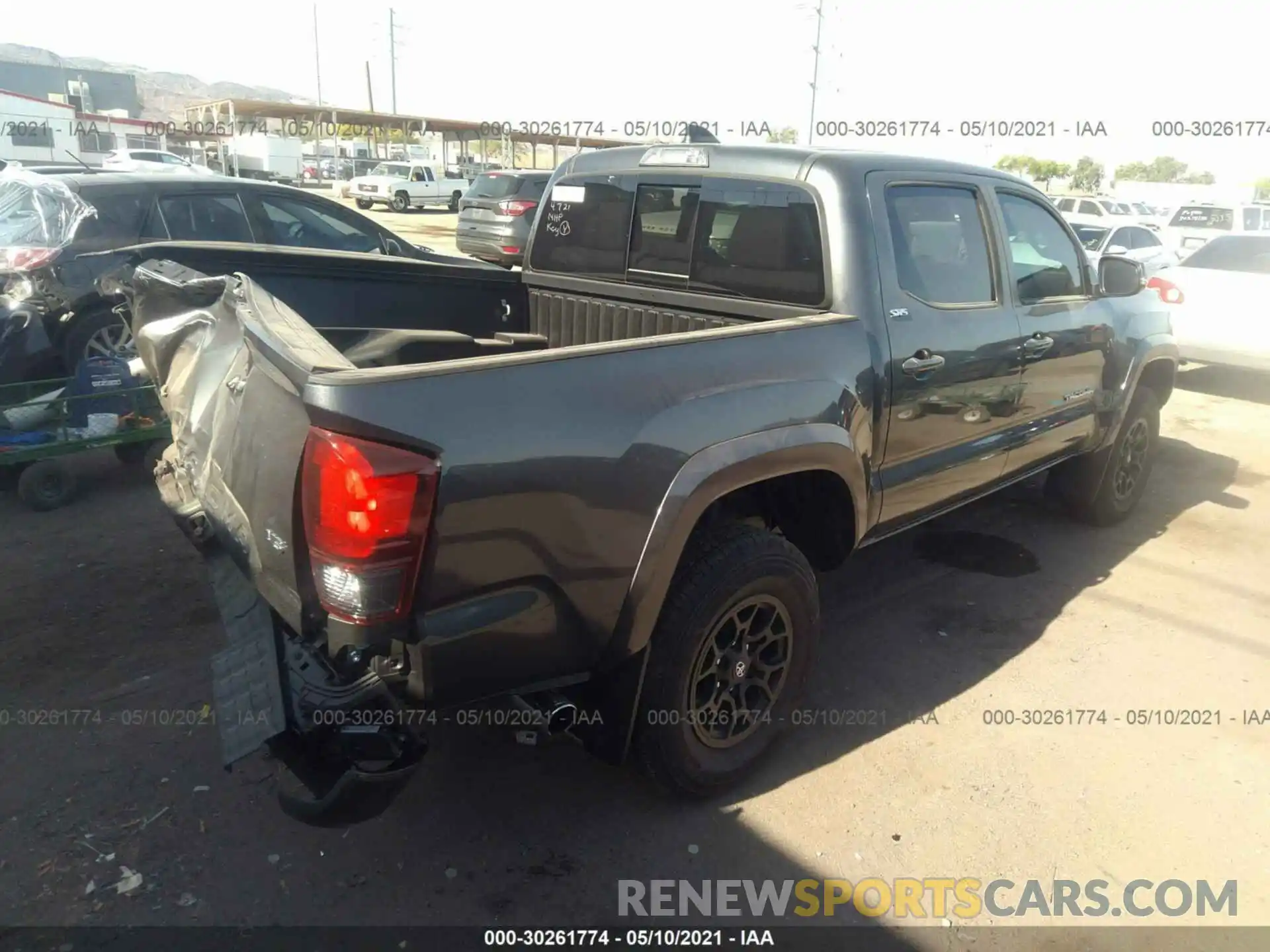 4 Photograph of a damaged car 3TMCZ5AN6MM402893 TOYOTA TACOMA 4WD 2021