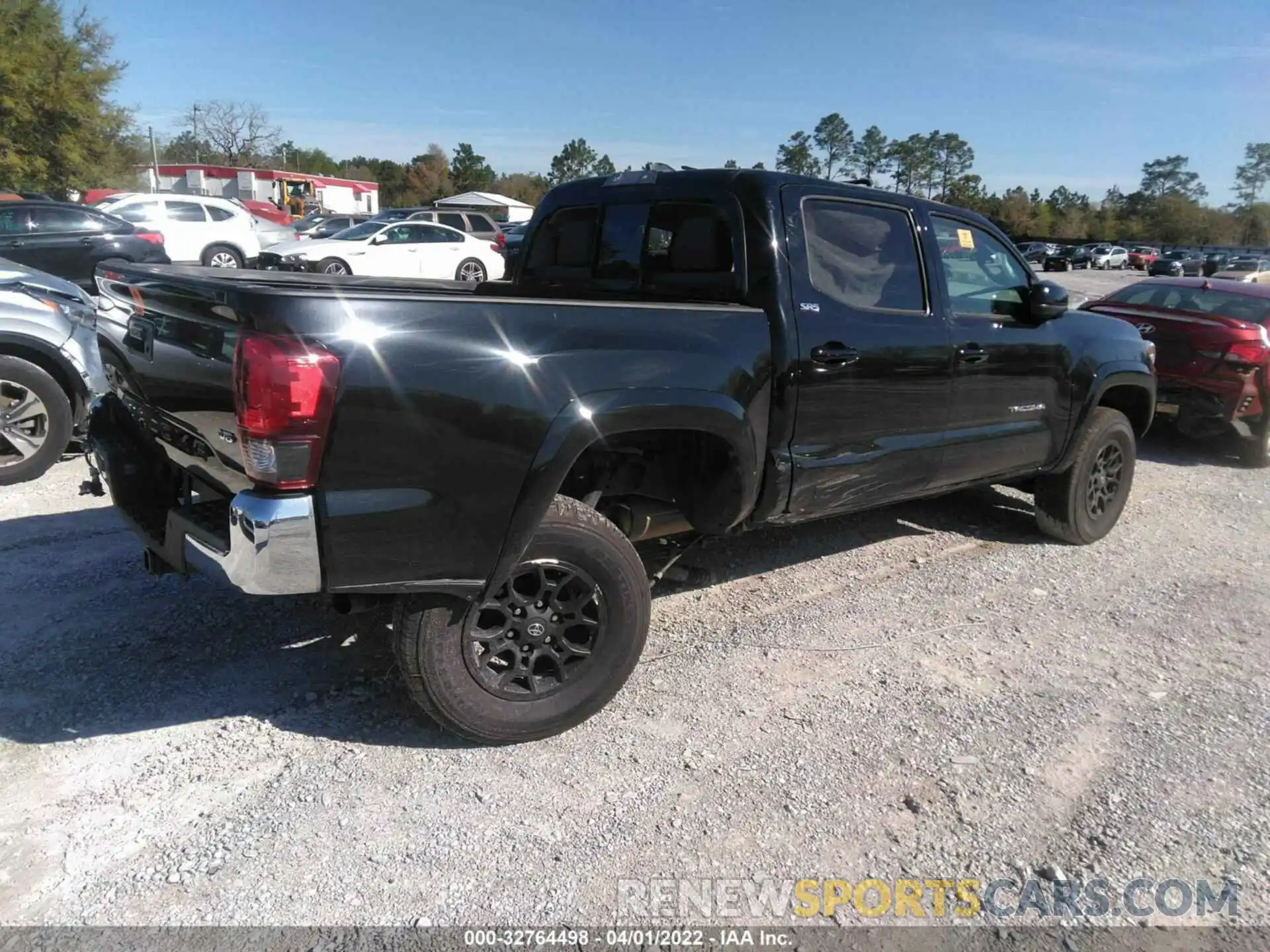 4 Photograph of a damaged car 3TMCZ5AN6MM433044 TOYOTA TACOMA 4WD 2021