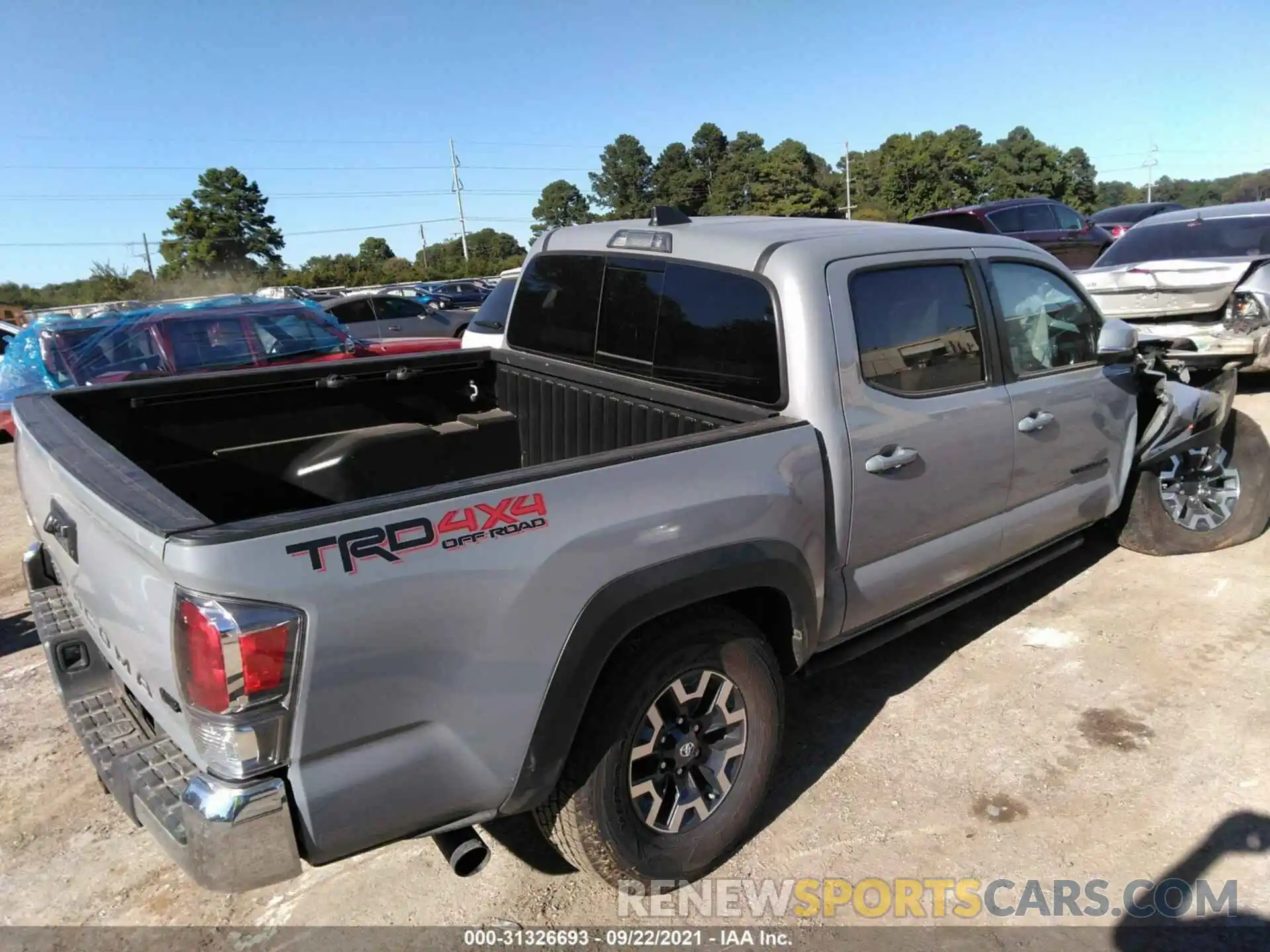 4 Photograph of a damaged car 3TMCZ5AN7MM407052 TOYOTA TACOMA 4WD 2021