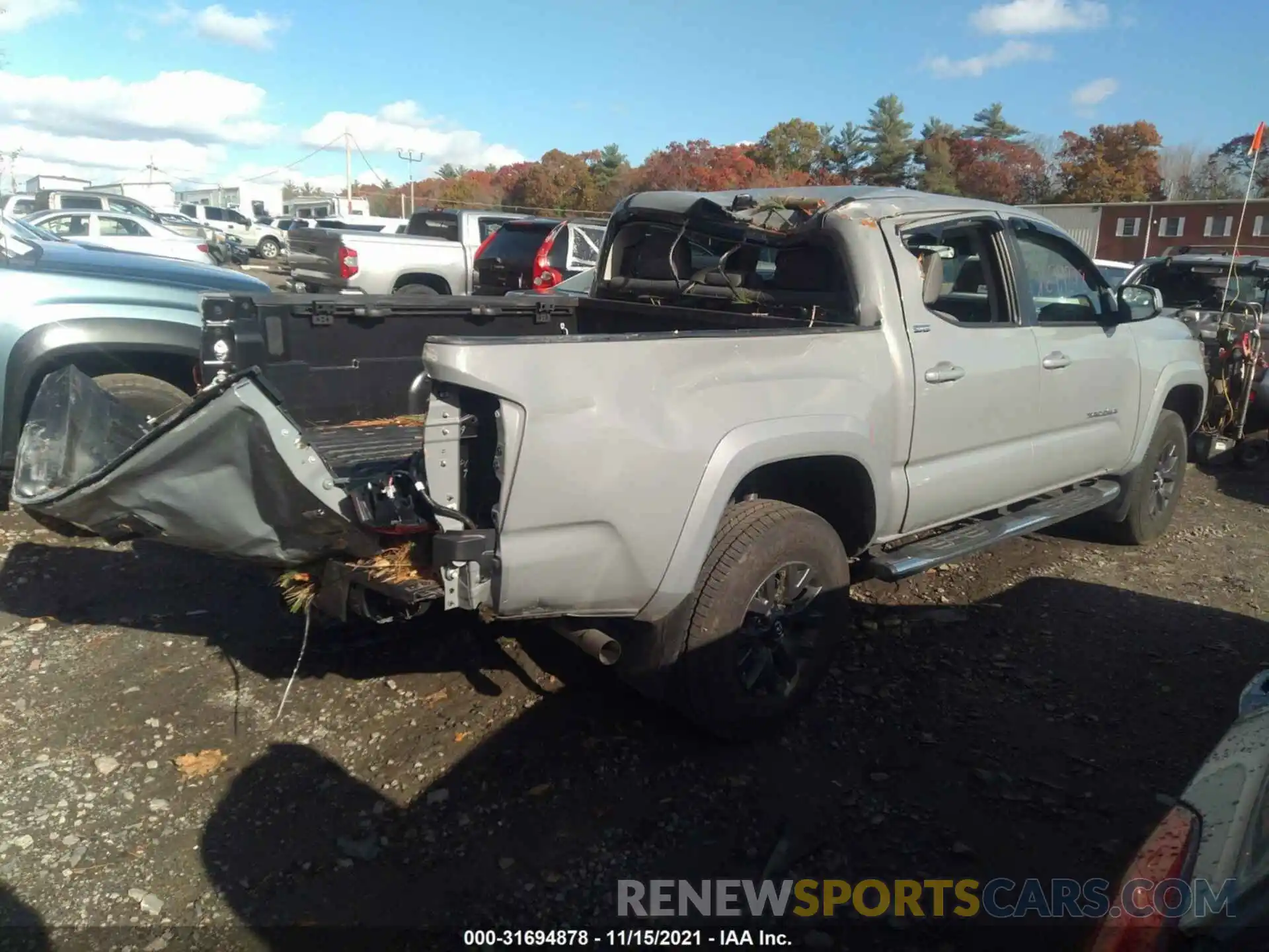 4 Photograph of a damaged car 3TMCZ5AN8MM398930 TOYOTA TACOMA 4WD 2021