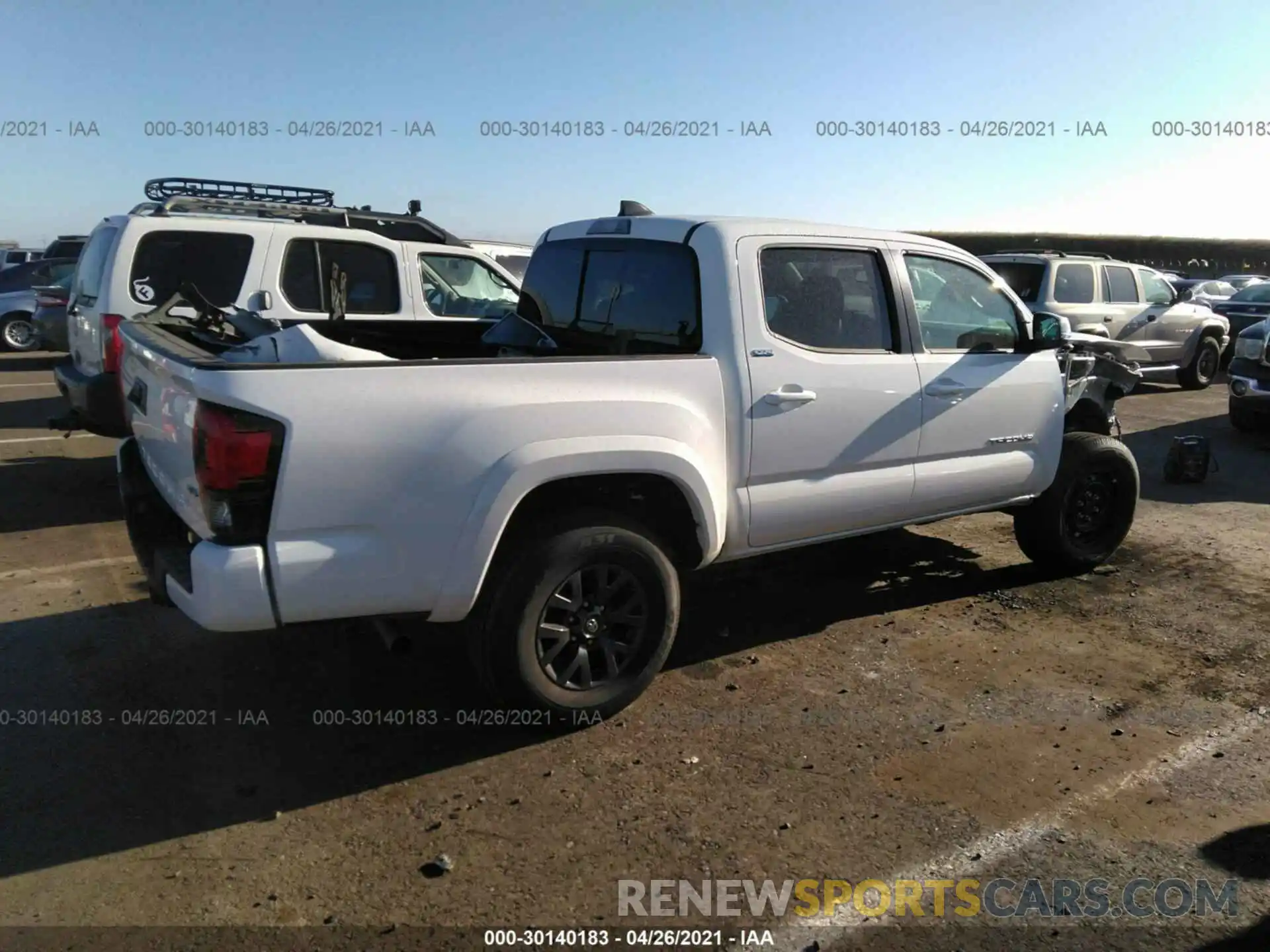 4 Photograph of a damaged car 3TMCZ5AN9MM371834 TOYOTA TACOMA 4WD 2021