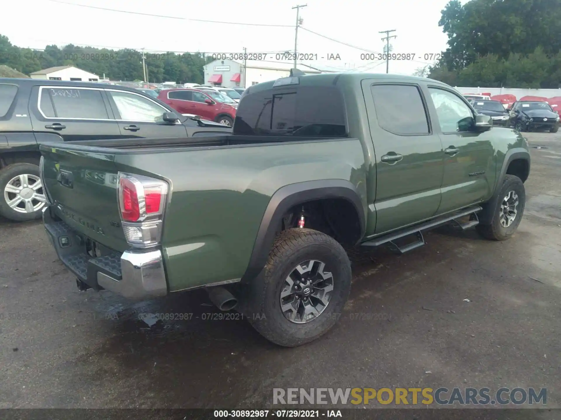 4 Photograph of a damaged car 3TMCZ5AN9MM374863 TOYOTA TACOMA 4WD 2021