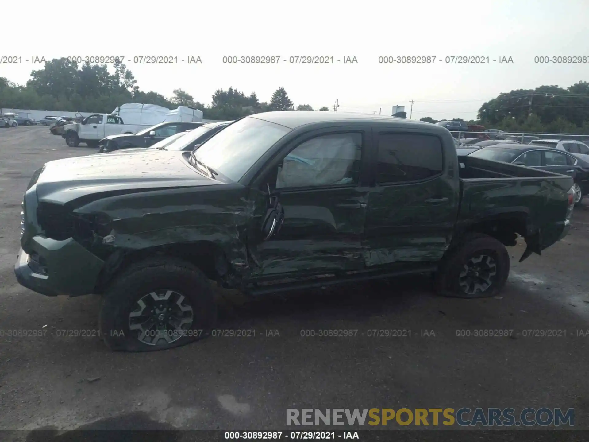 6 Photograph of a damaged car 3TMCZ5AN9MM374863 TOYOTA TACOMA 4WD 2021