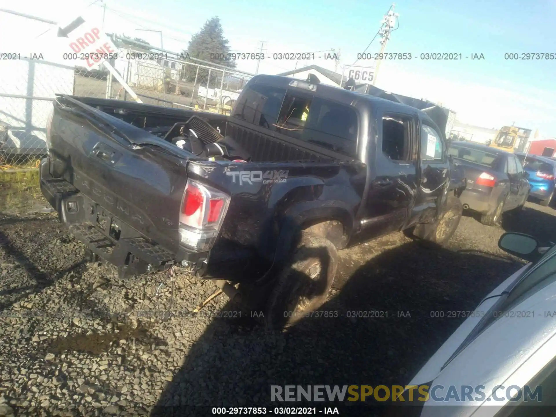 4 Photograph of a damaged car 3TMCZ5AN9MM391209 TOYOTA TACOMA 4WD 2021