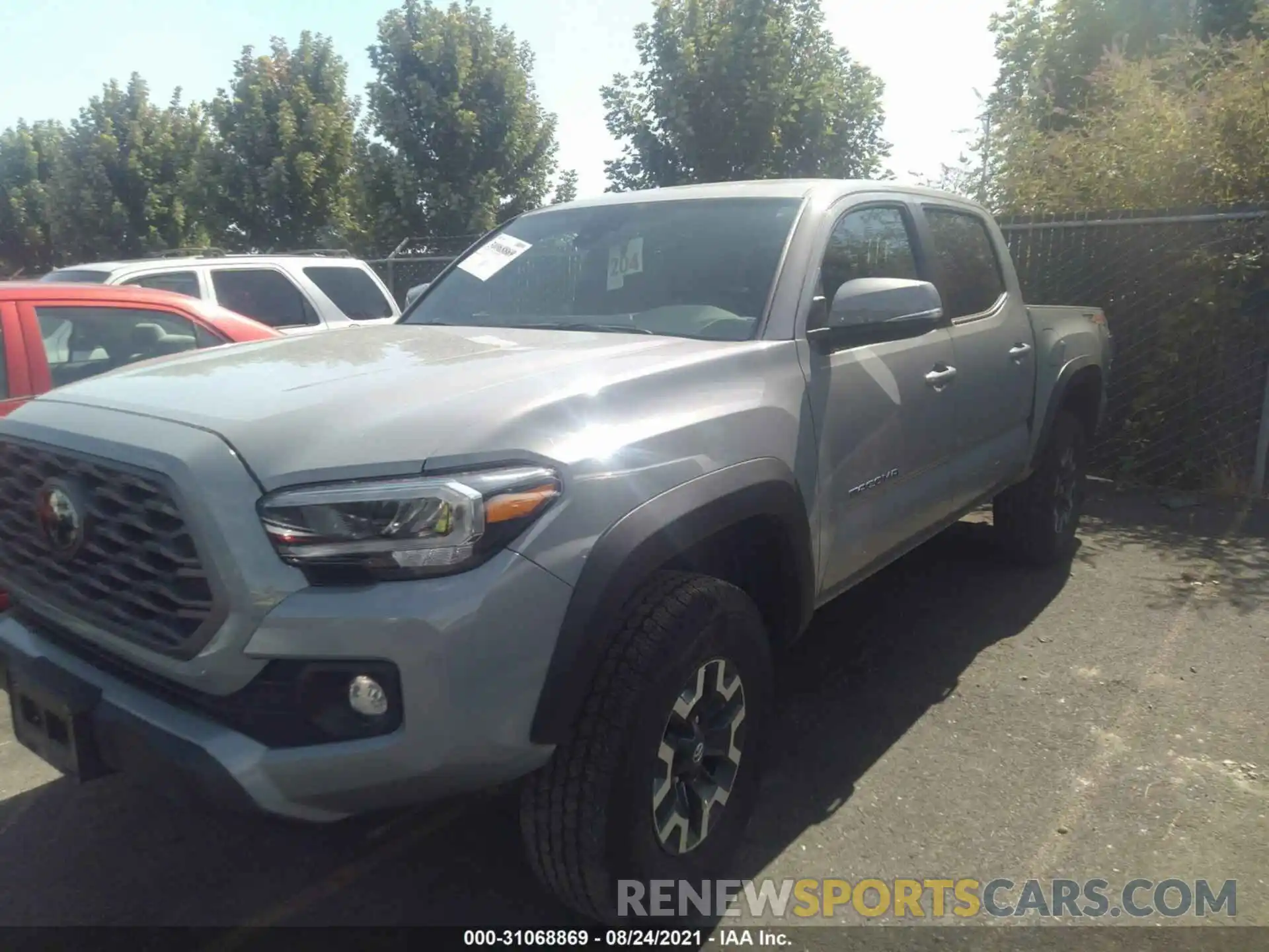 2 Photograph of a damaged car 3TMCZ5AN9MM393204 TOYOTA TACOMA 4WD 2021