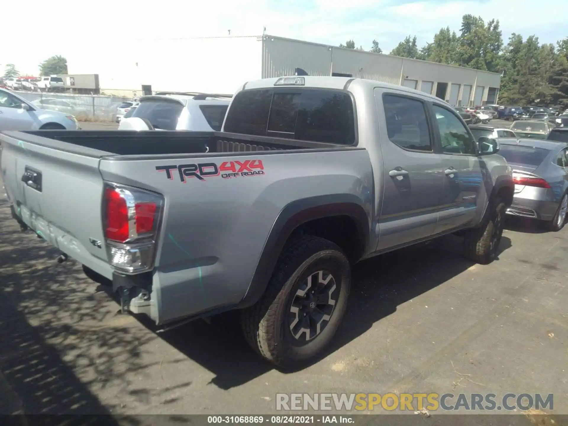 4 Photograph of a damaged car 3TMCZ5AN9MM393204 TOYOTA TACOMA 4WD 2021