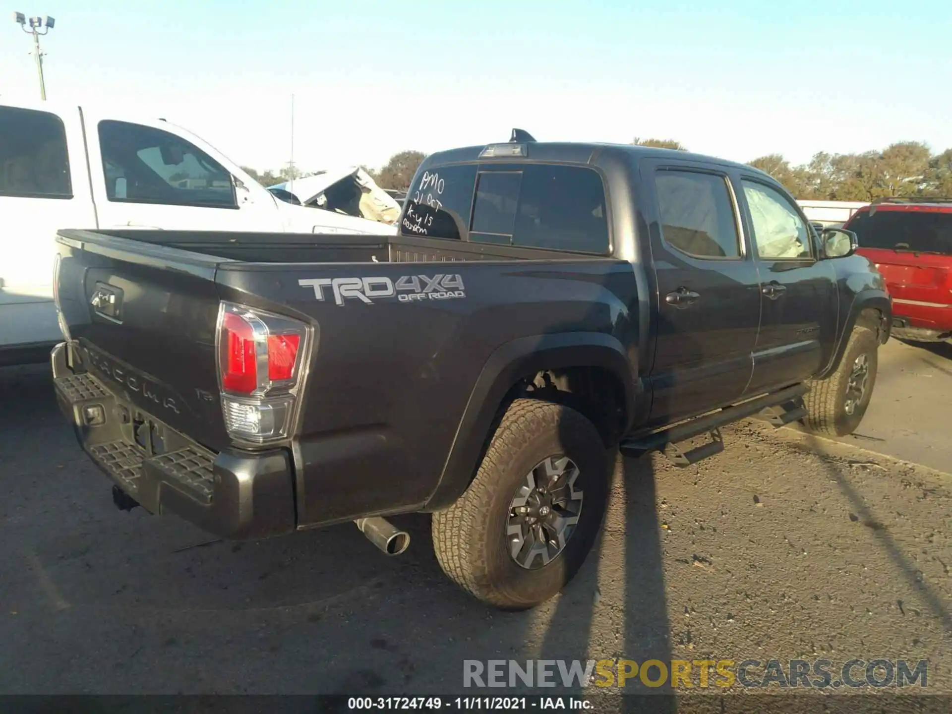 4 Photograph of a damaged car 3TMCZ5AN9MM396085 TOYOTA TACOMA 4WD 2021