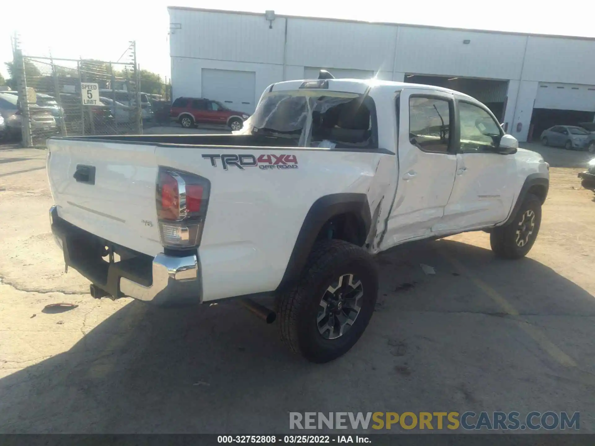 4 Photograph of a damaged car 3TMCZ5AN9MM433250 TOYOTA TACOMA 4WD 2021