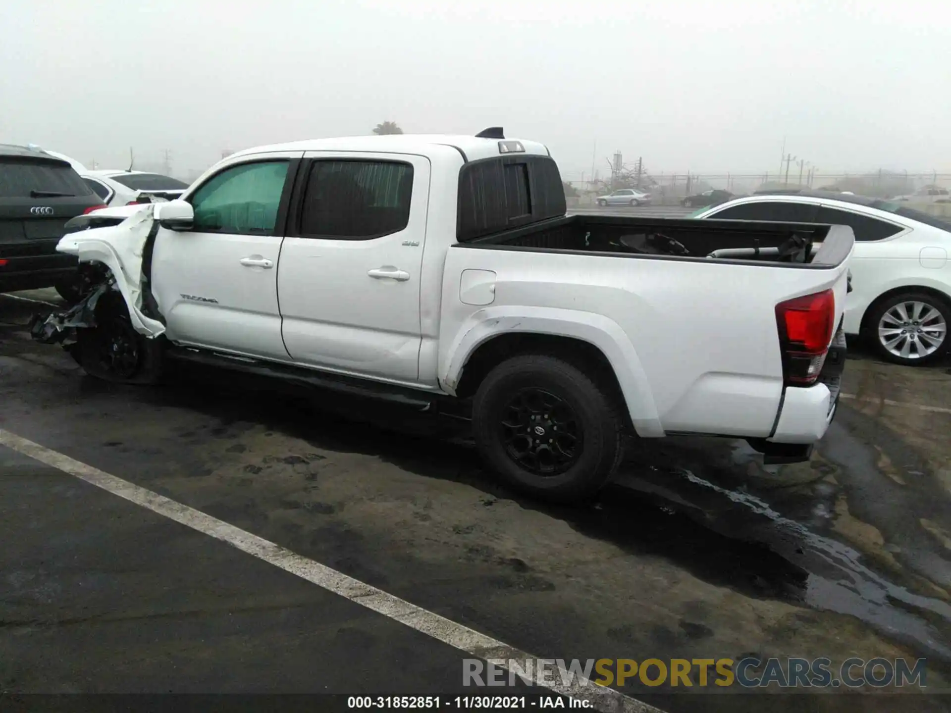 3 Photograph of a damaged car 3TMCZ5AN9MM453059 TOYOTA TACOMA 4WD 2021