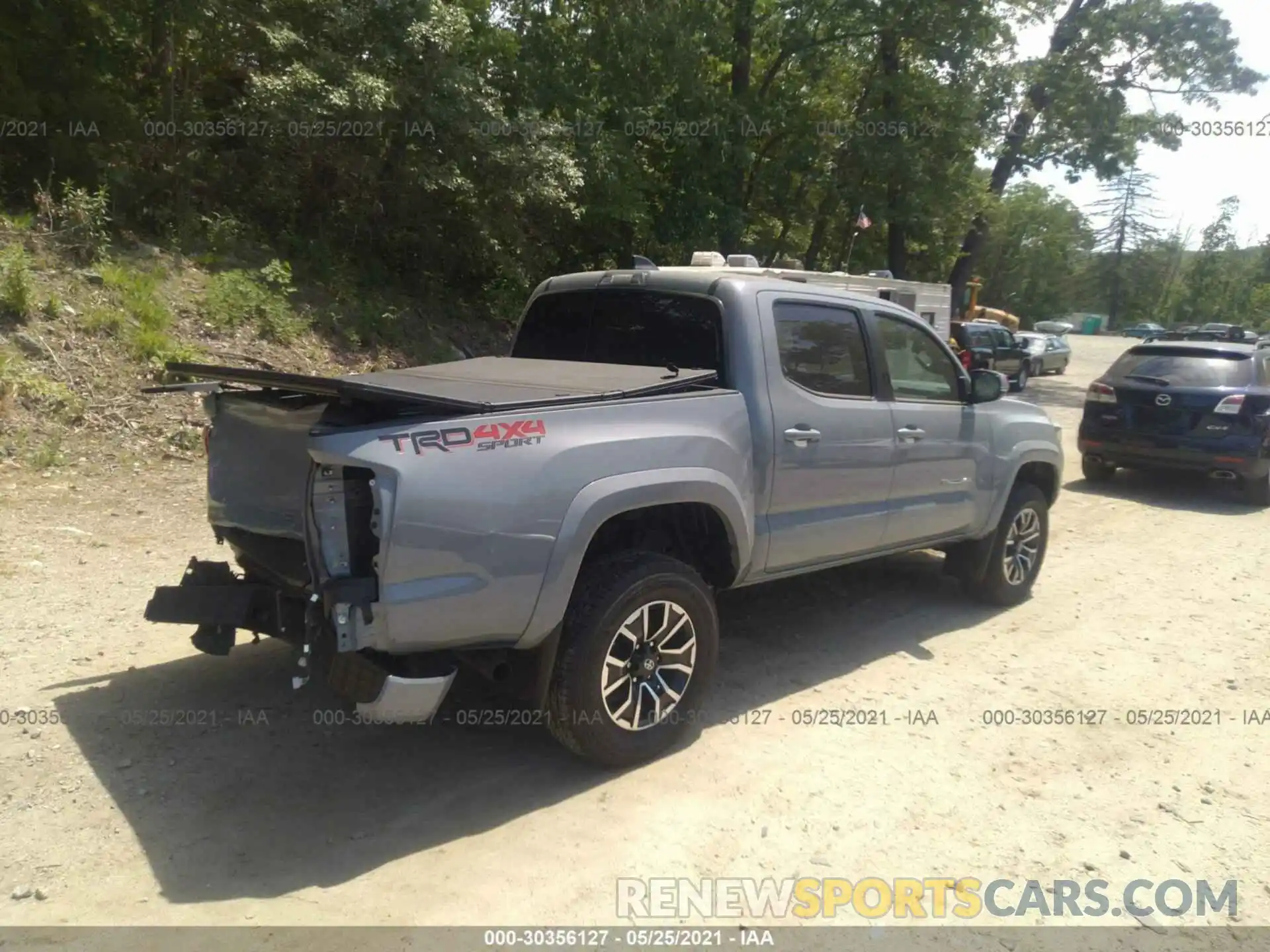 4 Photograph of a damaged car 3TMCZ5ANXMM372085 TOYOTA TACOMA 4WD 2021