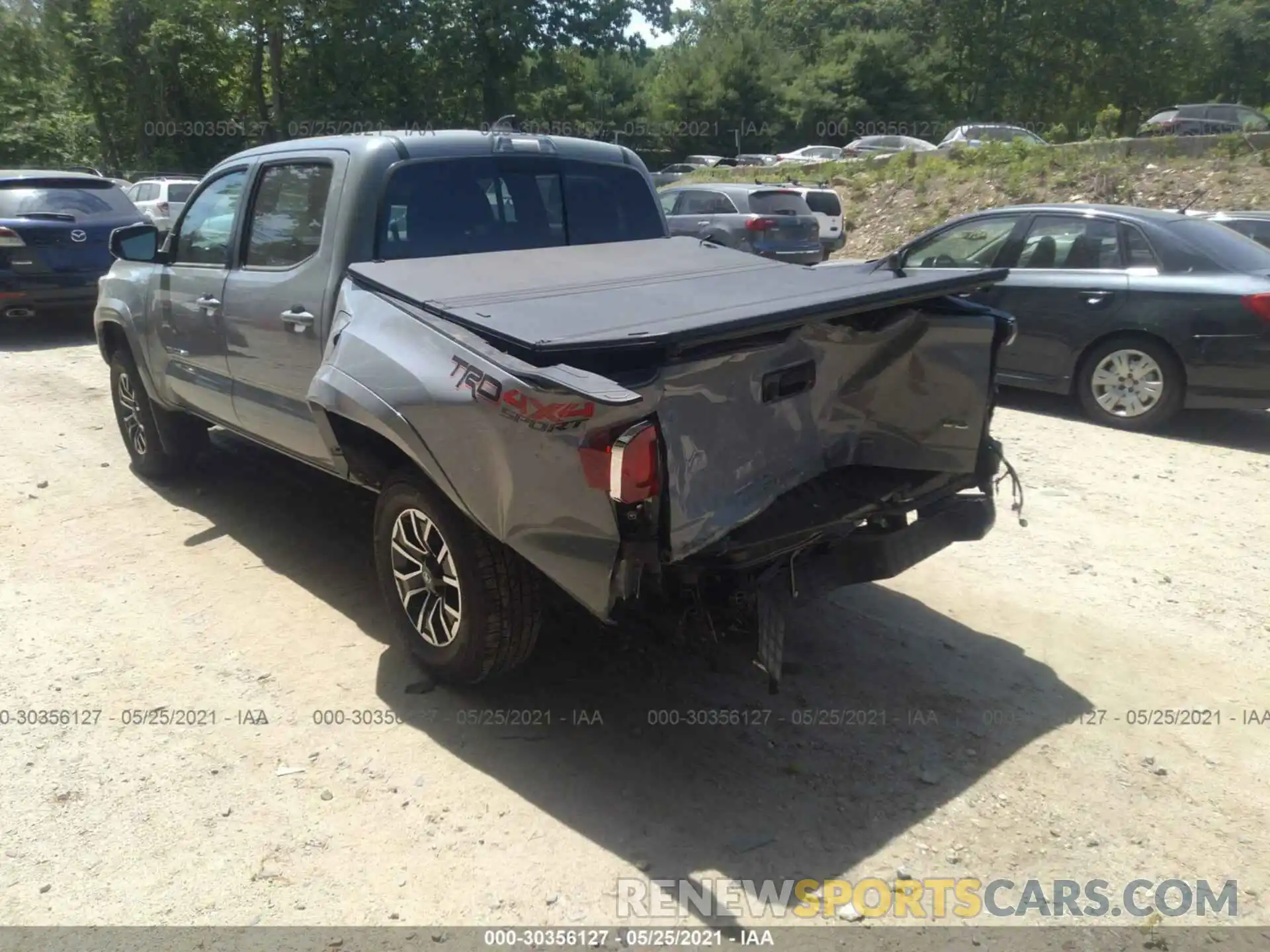 6 Photograph of a damaged car 3TMCZ5ANXMM372085 TOYOTA TACOMA 4WD 2021