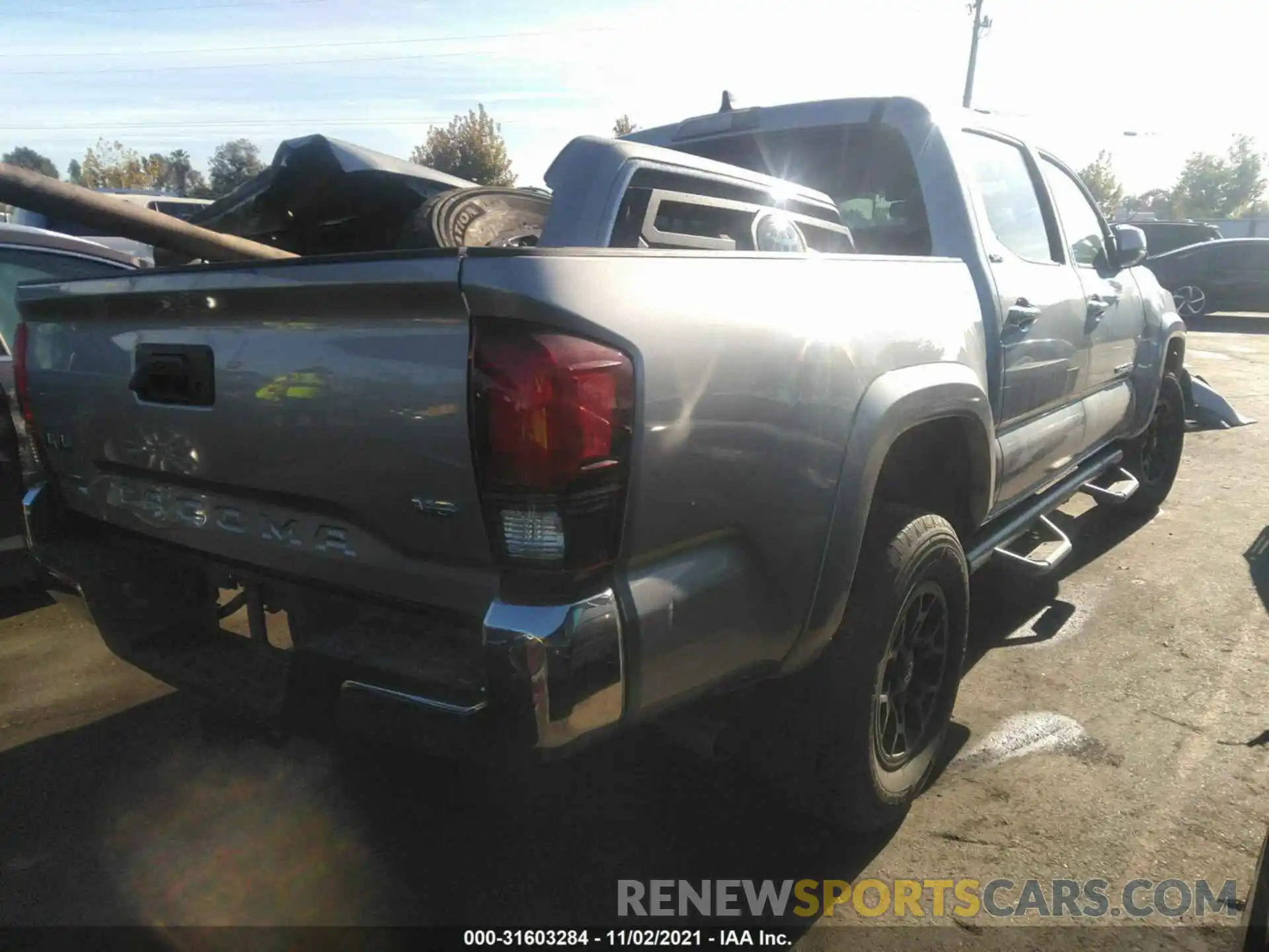 4 Photograph of a damaged car 3TMCZ5ANXMM377125 TOYOTA TACOMA 4WD 2021