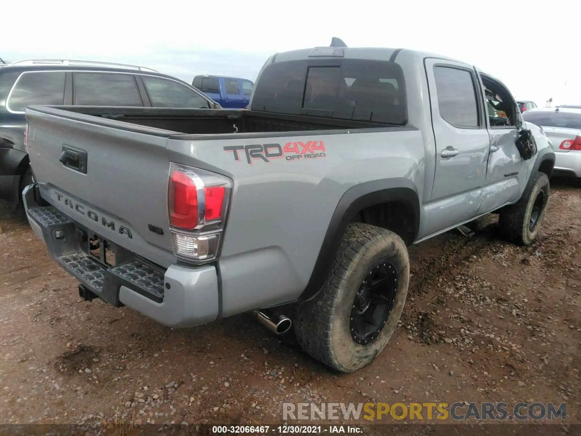 4 Photograph of a damaged car 3TMCZ5ANXMM394152 TOYOTA TACOMA 4WD 2021