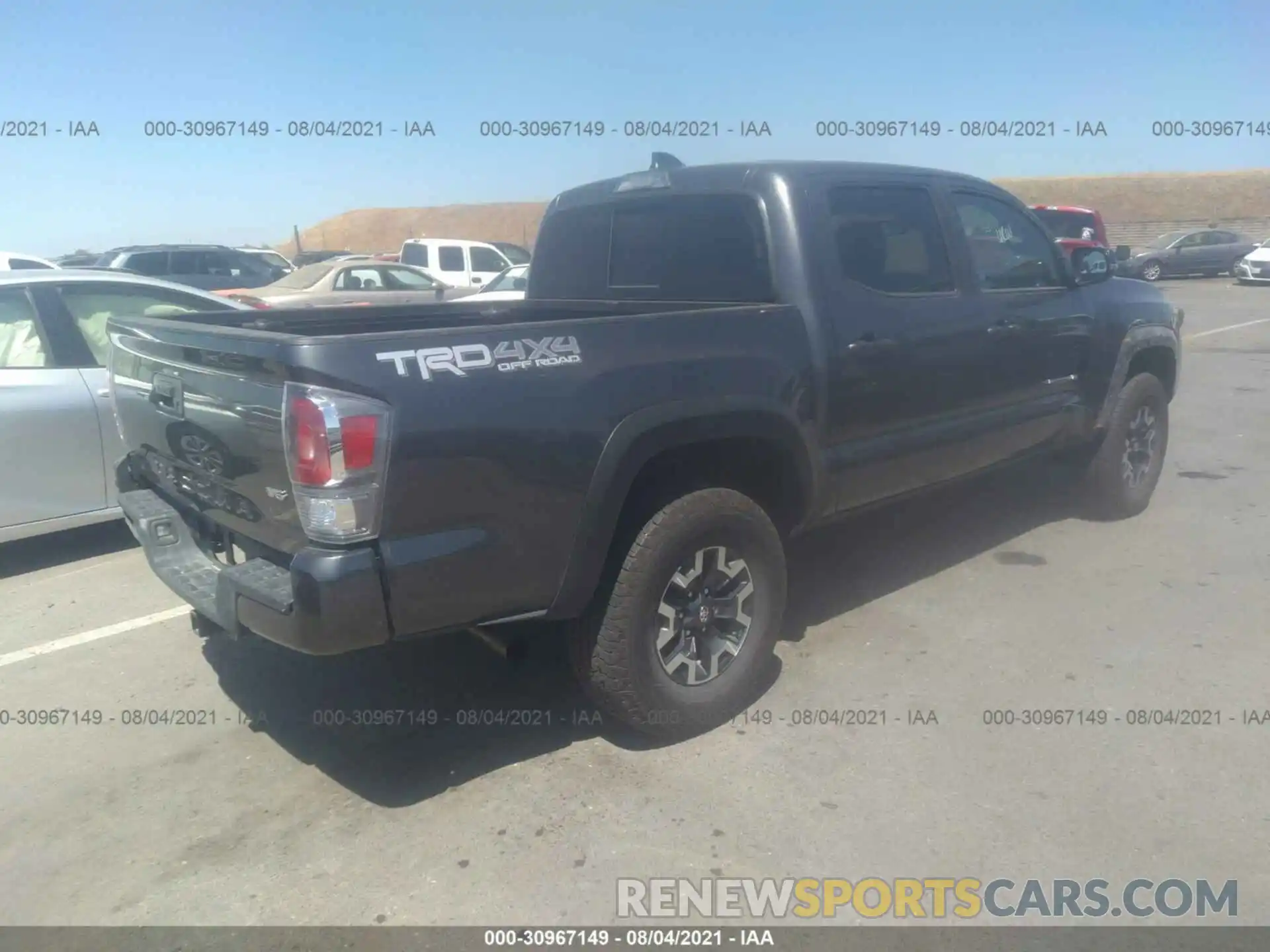 4 Photograph of a damaged car 3TMCZ5ANXMM399707 TOYOTA TACOMA 4WD 2021