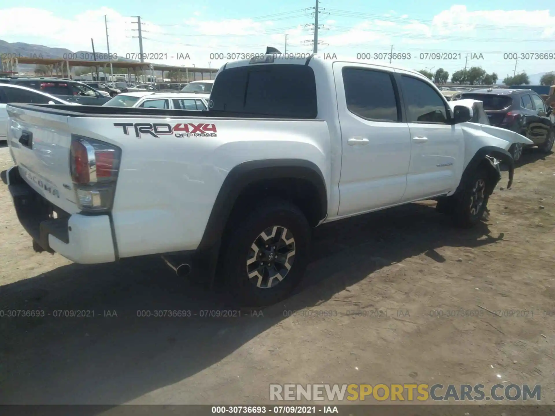 4 Photograph of a damaged car 3TMCZ5ANXMM404081 TOYOTA TACOMA 4WD 2021