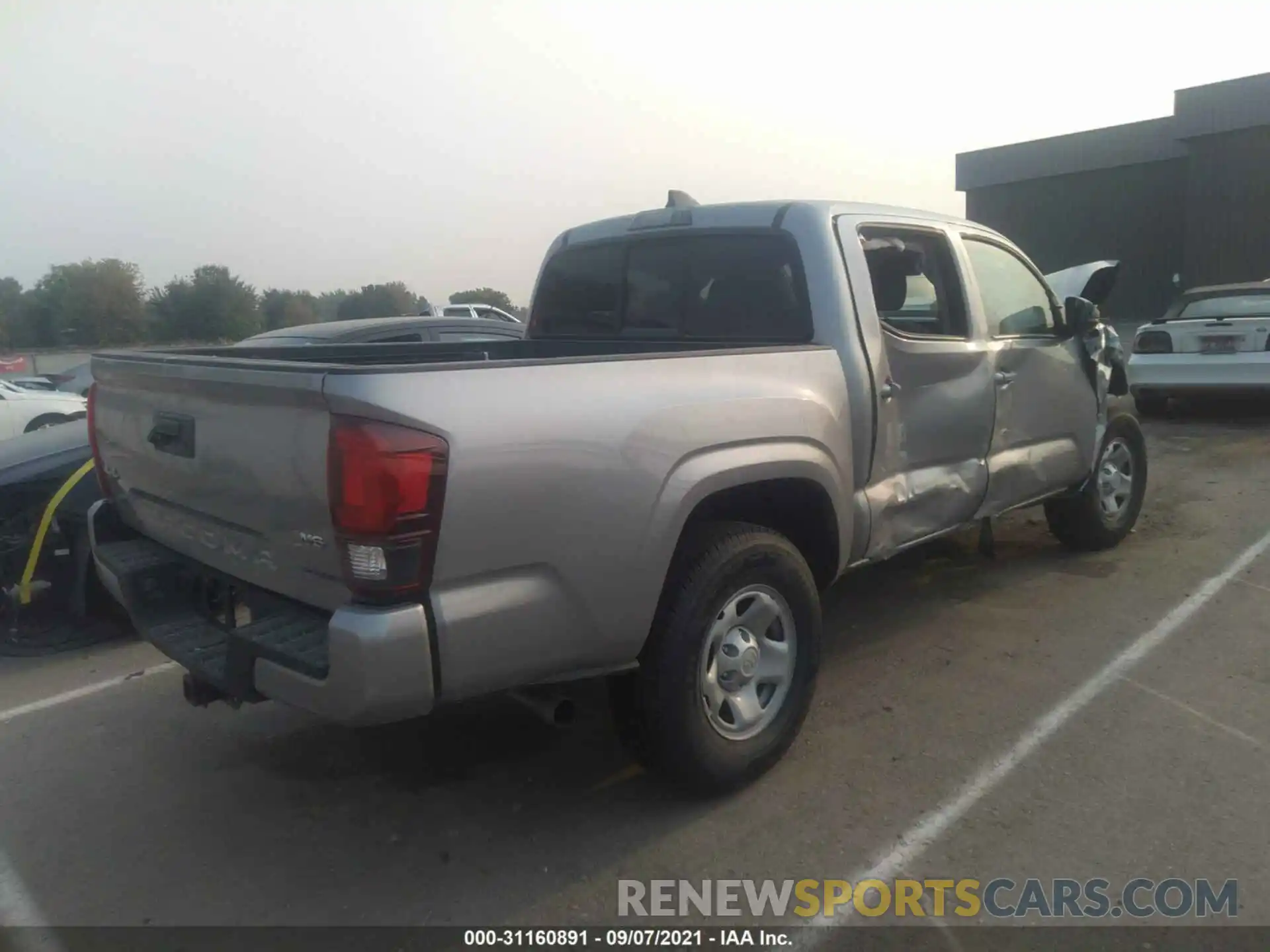 4 Photograph of a damaged car 3TMCZ5ANXMM406333 TOYOTA TACOMA 4WD 2021