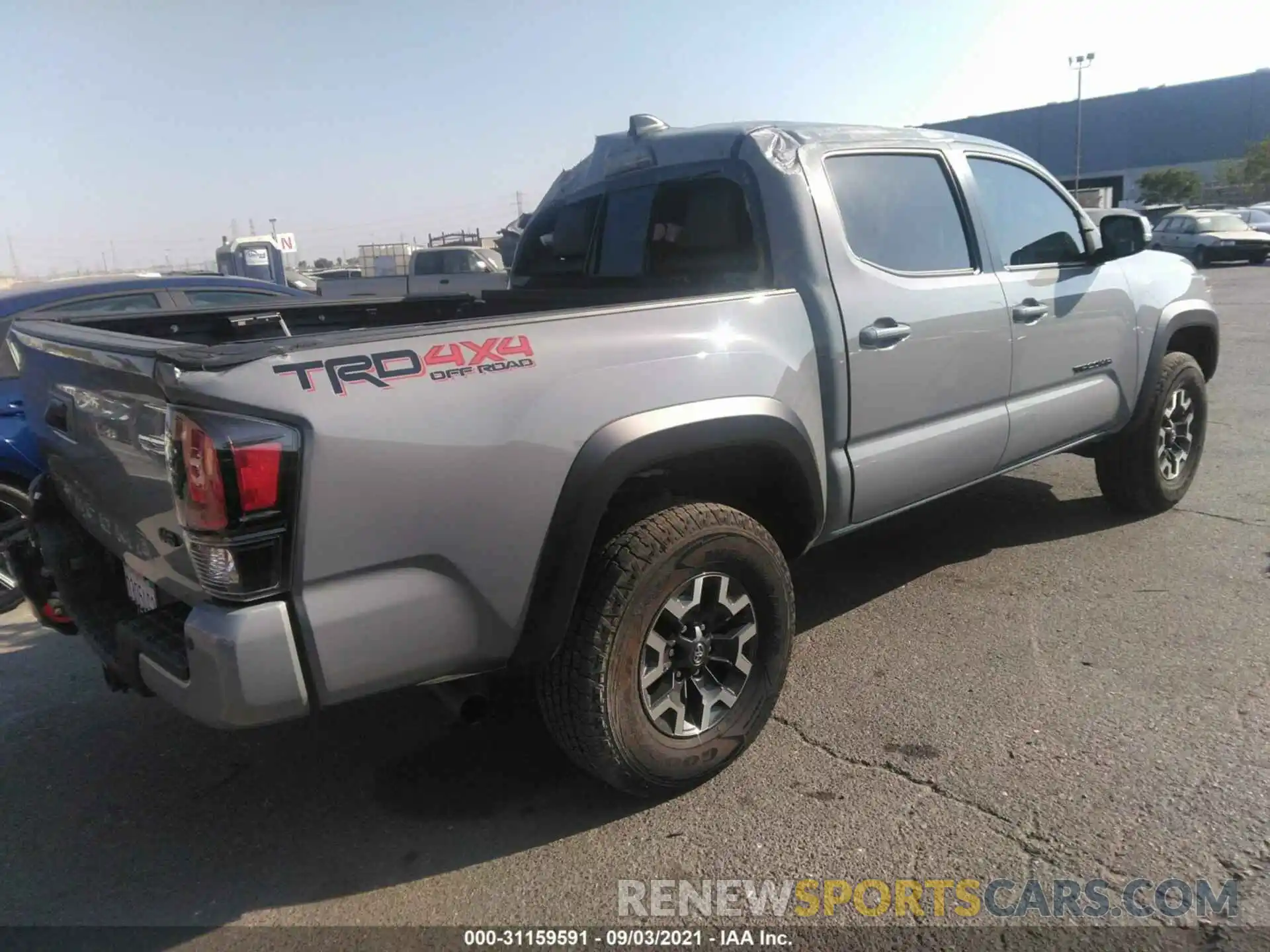 4 Photograph of a damaged car 3TMCZ5ANXMM428977 TOYOTA TACOMA 4WD 2021