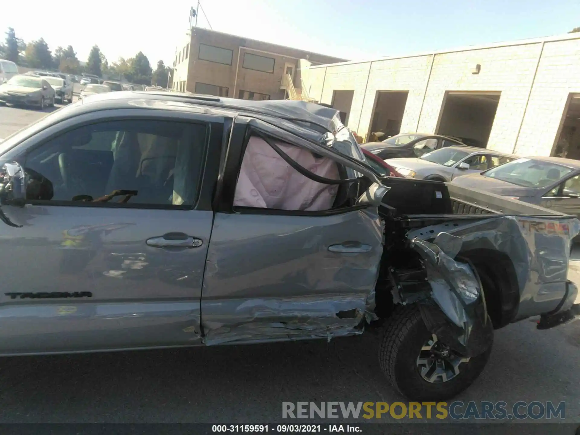 6 Photograph of a damaged car 3TMCZ5ANXMM428977 TOYOTA TACOMA 4WD 2021