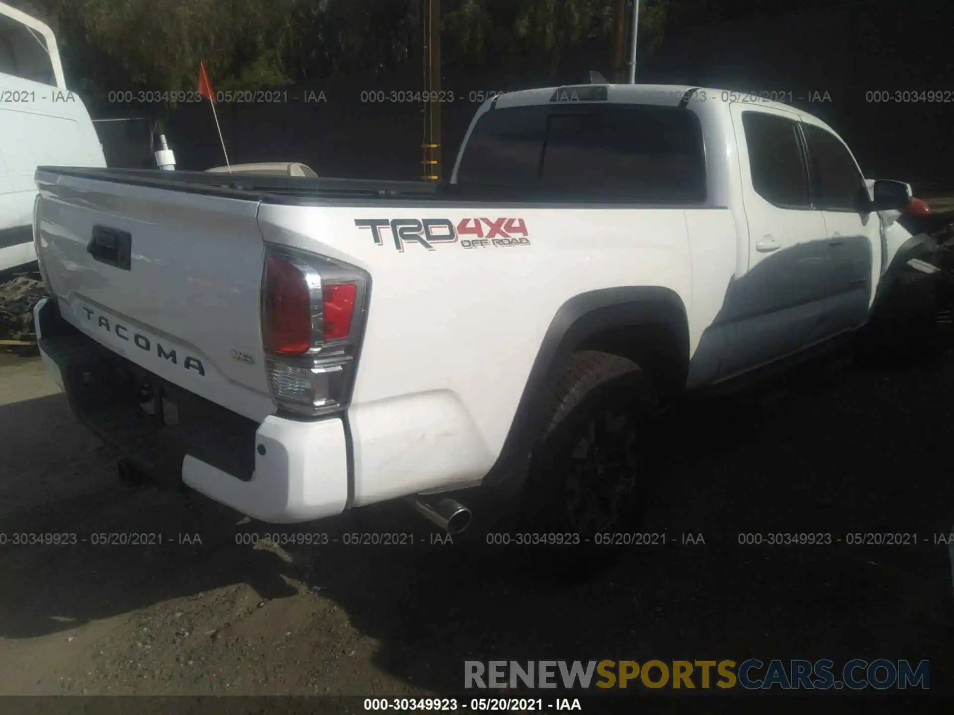 4 Photograph of a damaged car 3TMDZ5BN0MM099533 TOYOTA TACOMA 4WD 2021