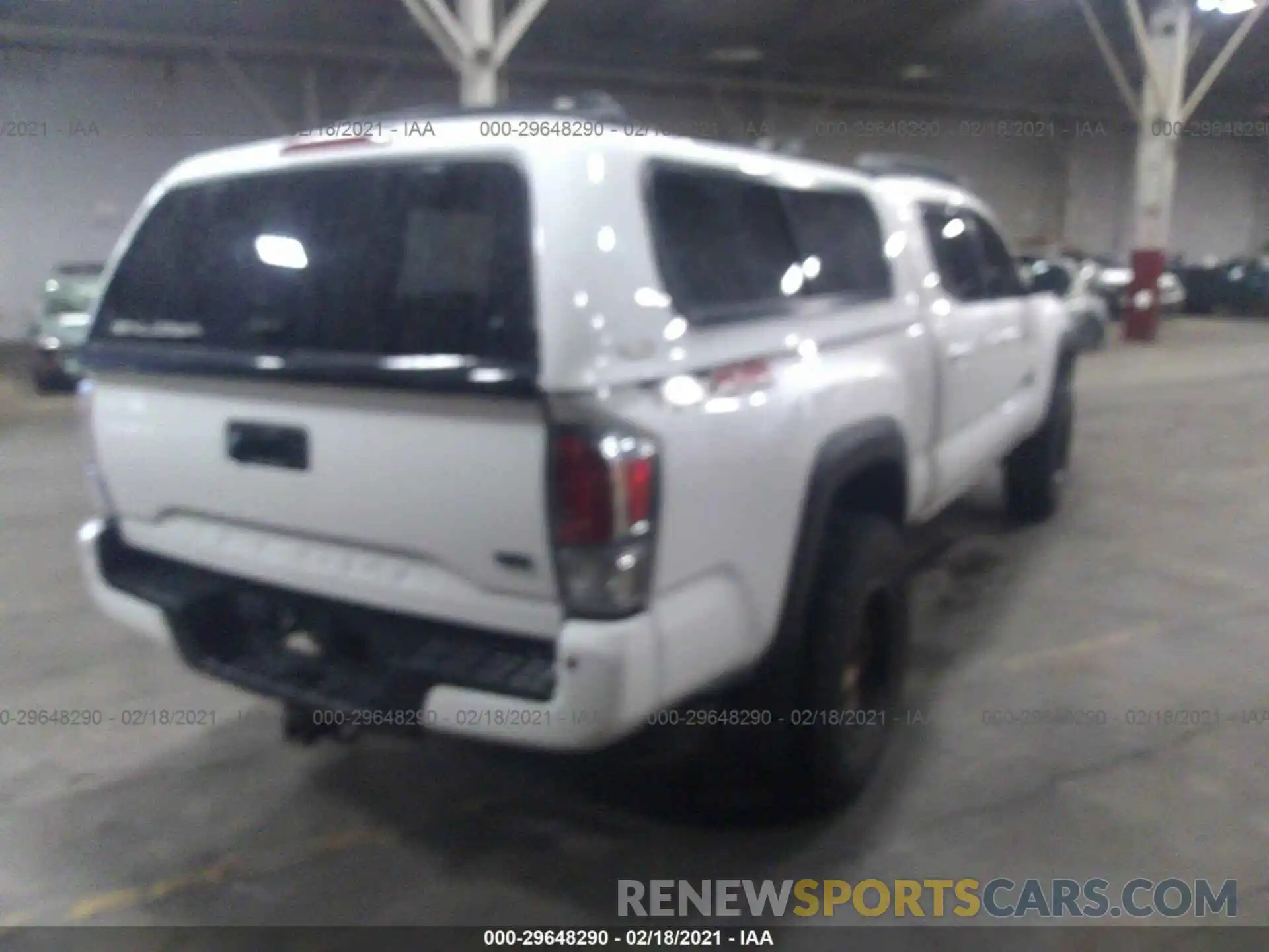 4 Photograph of a damaged car 3TMDZ5BN2MM098786 TOYOTA TACOMA 4WD 2021