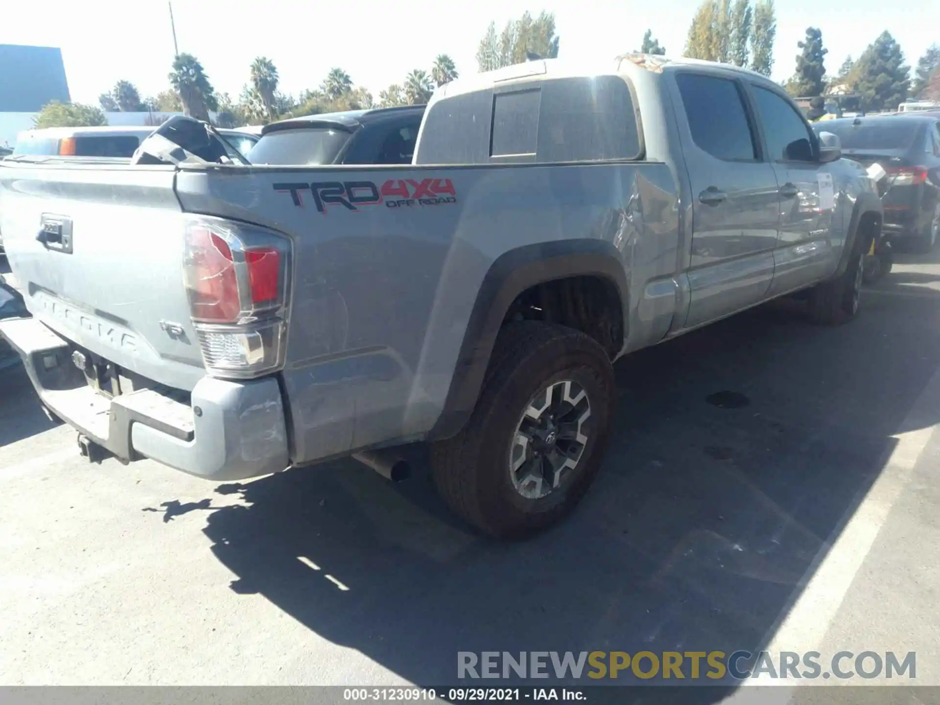 4 Photograph of a damaged car 3TMDZ5BN2MM108703 TOYOTA TACOMA 4WD 2021