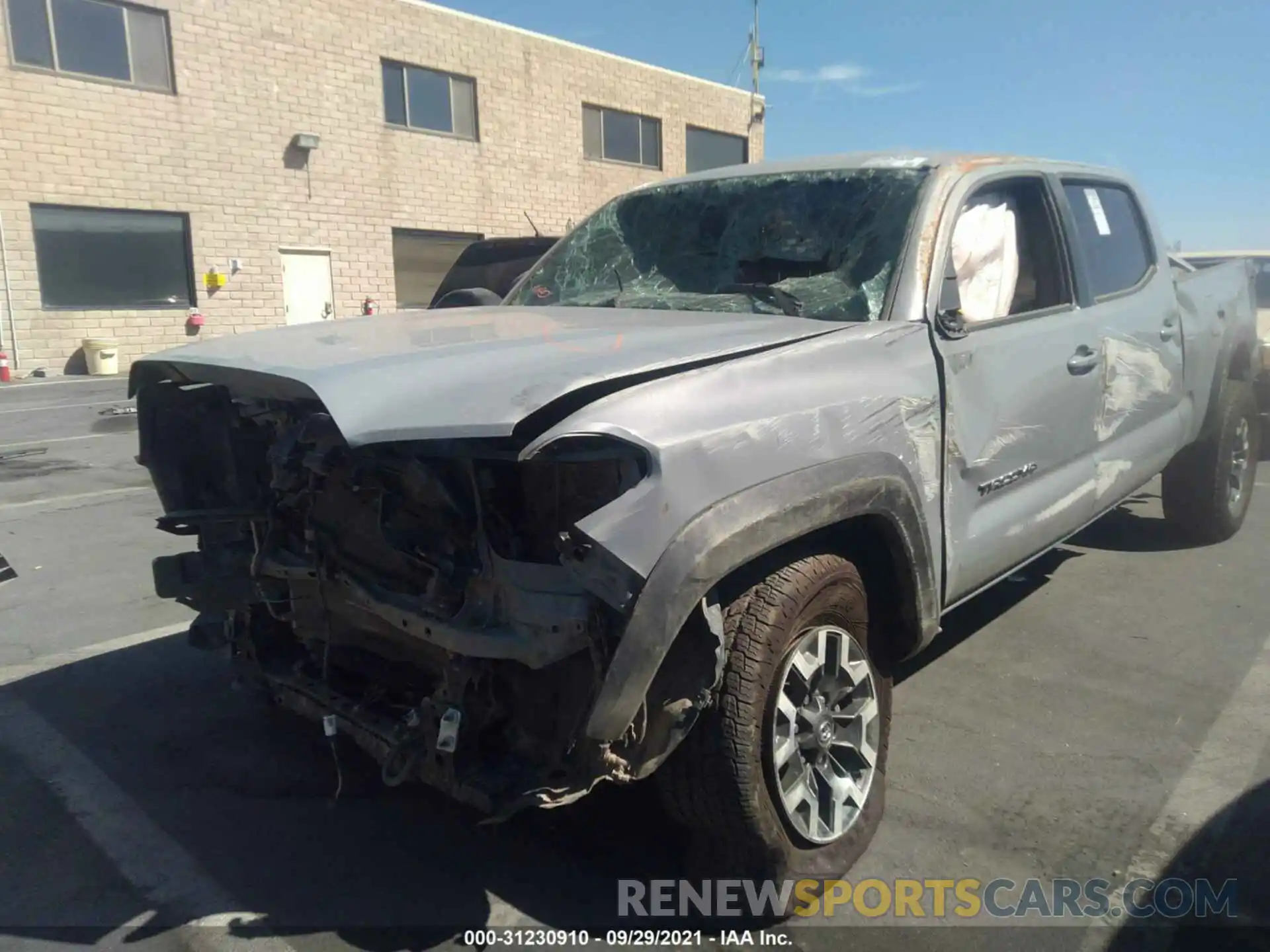 6 Photograph of a damaged car 3TMDZ5BN2MM108703 TOYOTA TACOMA 4WD 2021