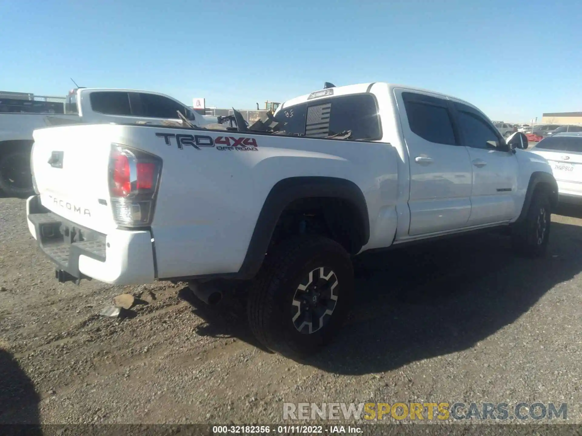 4 Photograph of a damaged car 3TMDZ5BN3MM114235 TOYOTA TACOMA 4WD 2021