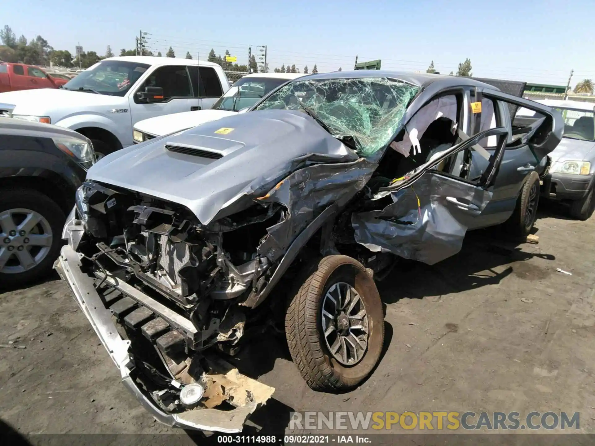 2 Photograph of a damaged car 3TMDZ5BN3MM117572 TOYOTA TACOMA 4WD 2021