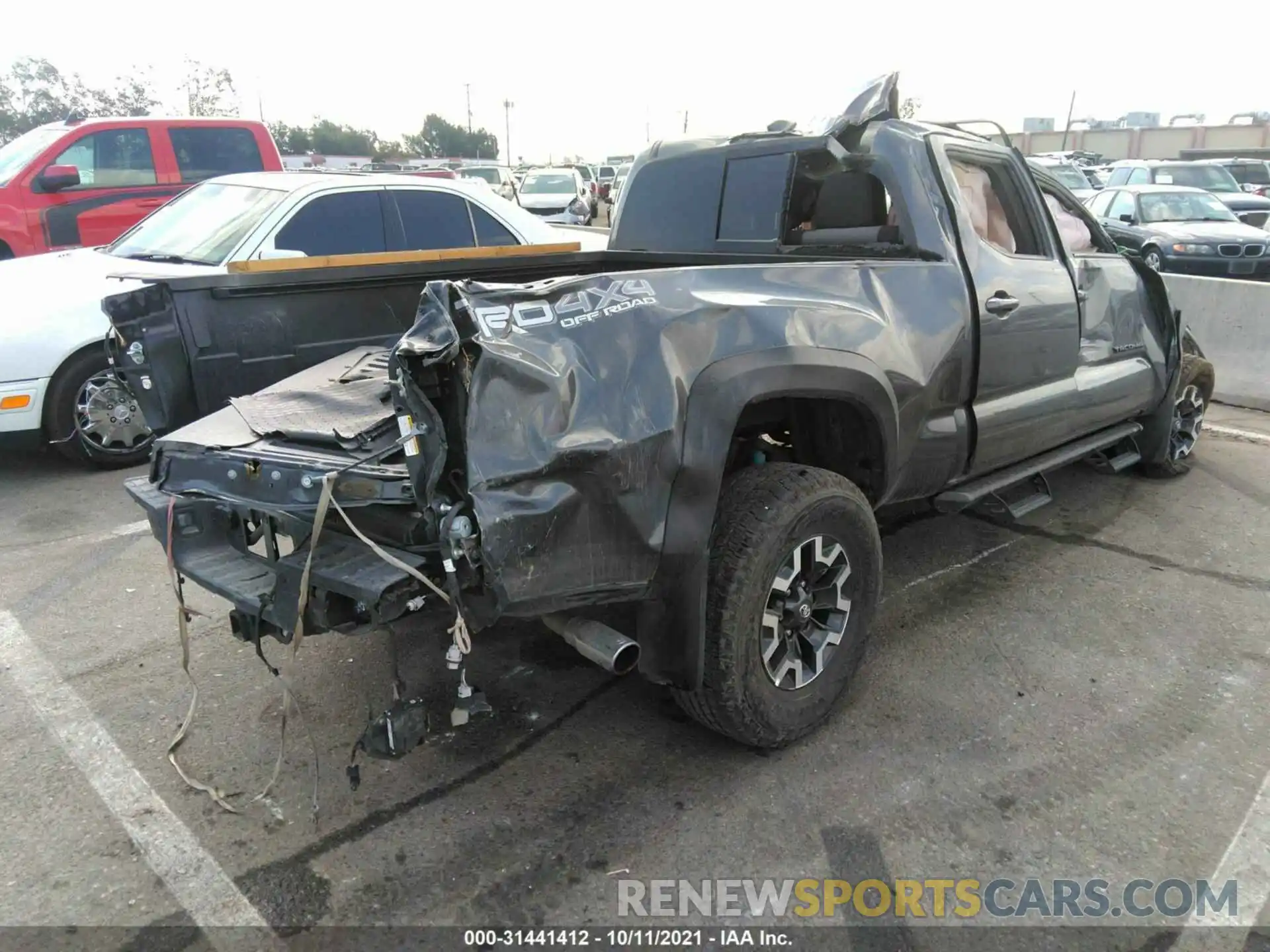 4 Photograph of a damaged car 3TMDZ5BN4MM102675 TOYOTA TACOMA 4WD 2021