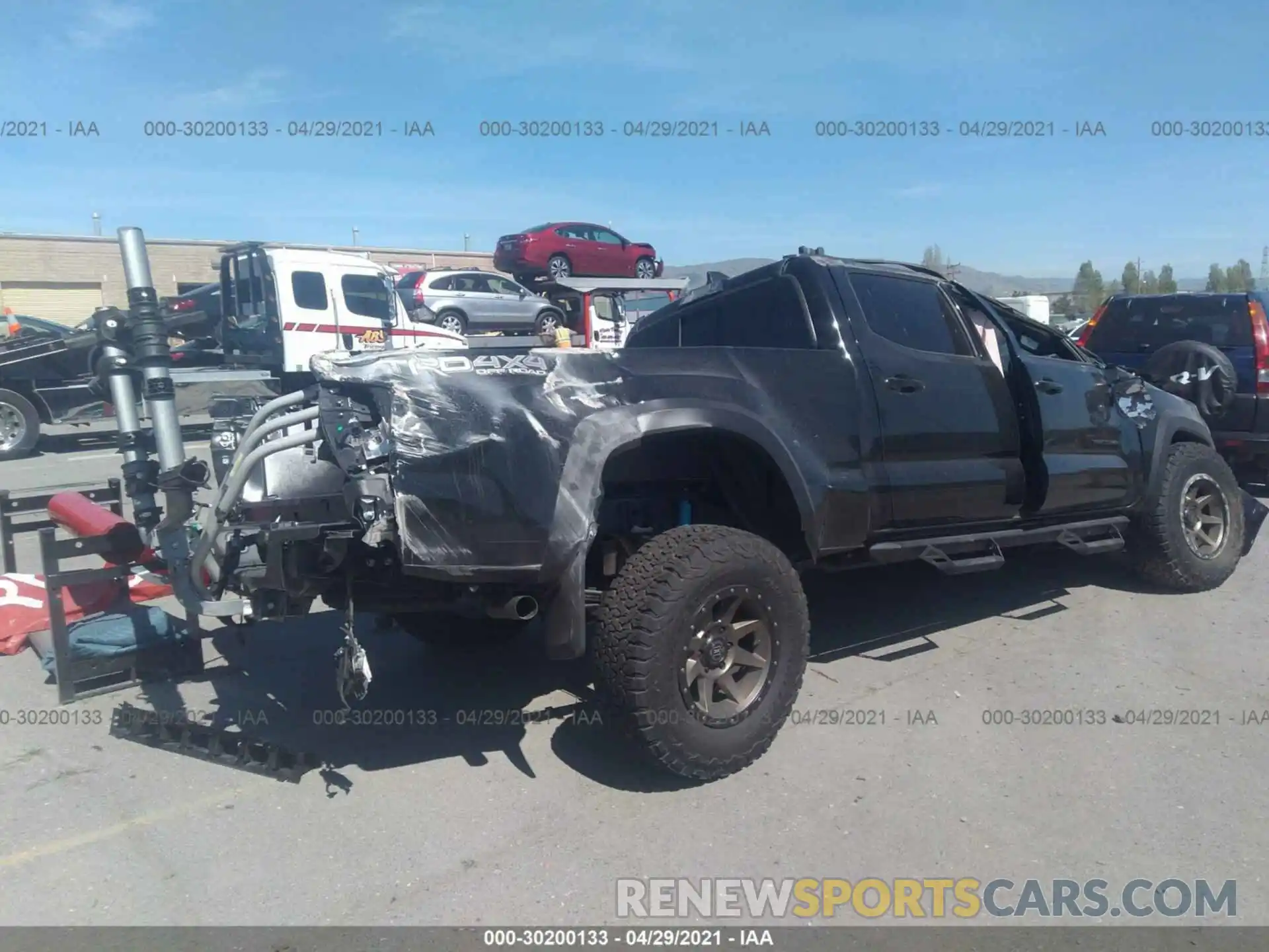 4 Photograph of a damaged car 3TMDZ5BN4MM107780 TOYOTA TACOMA 4WD 2021