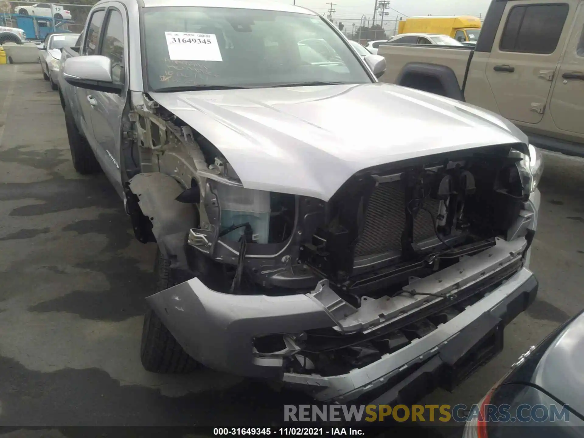 6 Photograph of a damaged car 3TMDZ5BN5MM105911 TOYOTA TACOMA 4WD 2021