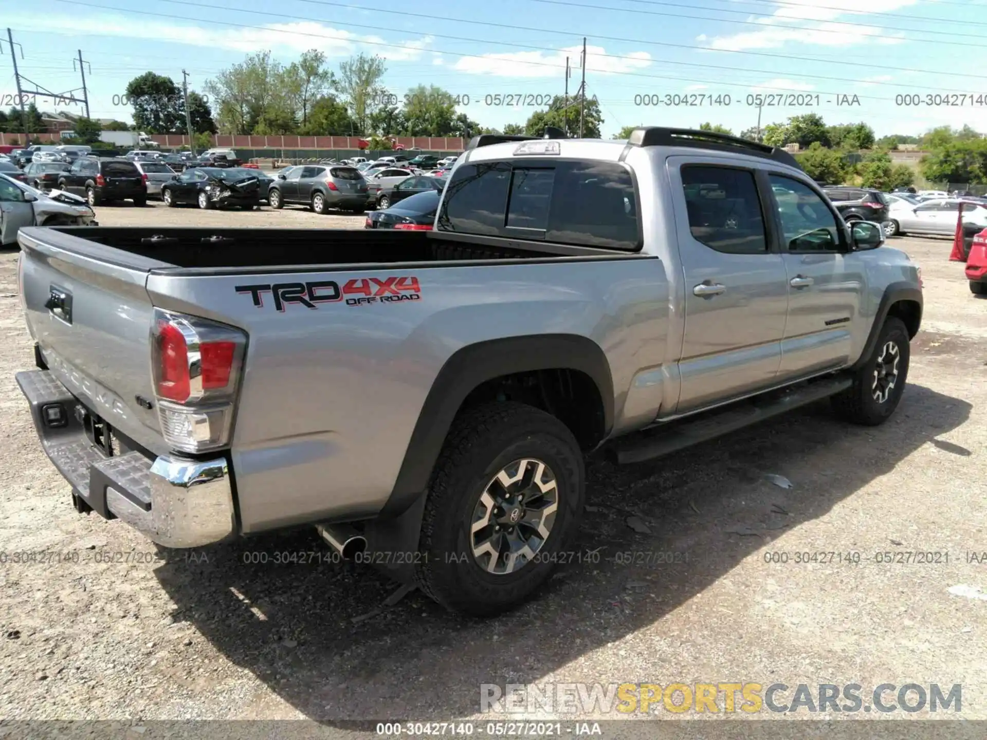 4 Photograph of a damaged car 3TMDZ5BN6MM100295 TOYOTA TACOMA 4WD 2021