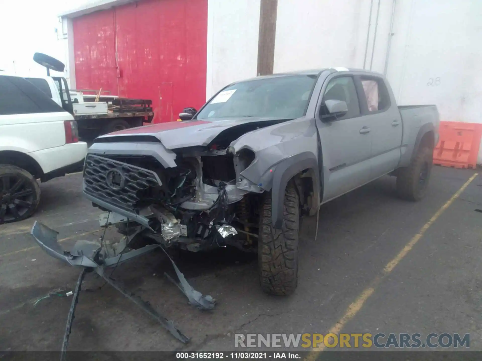 2 Photograph of a damaged car 3TMDZ5BN7MM101181 TOYOTA TACOMA 4WD 2021