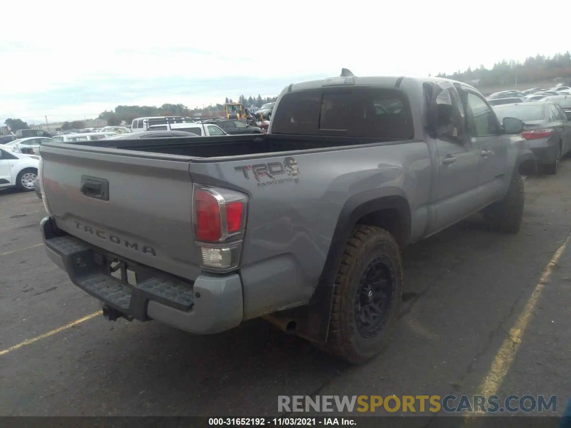 4 Photograph of a damaged car 3TMDZ5BN7MM101181 TOYOTA TACOMA 4WD 2021