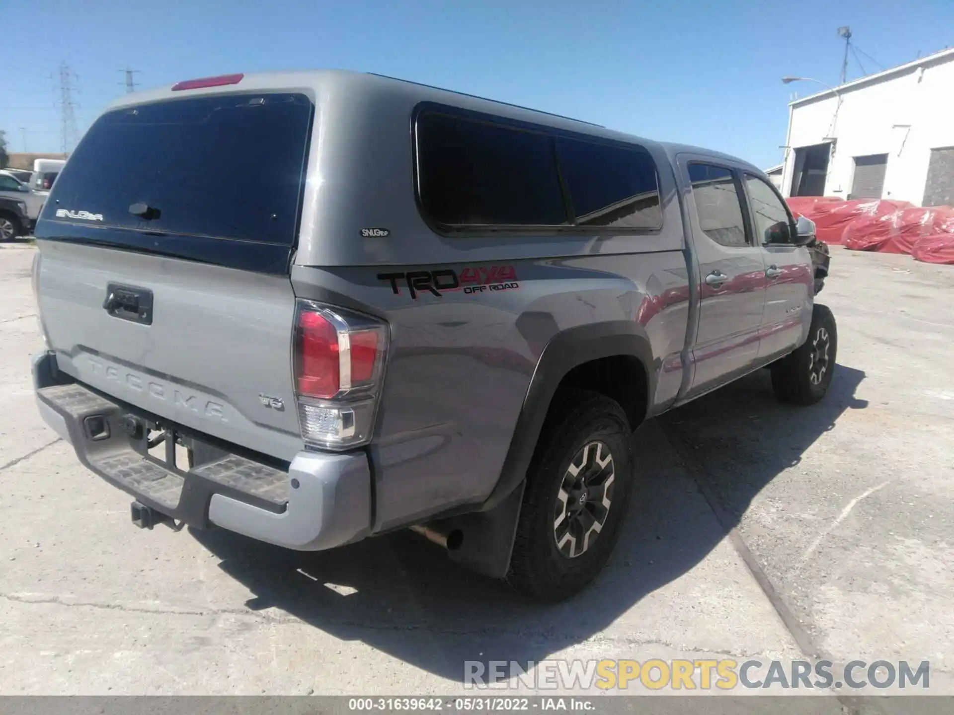 4 Photograph of a damaged car 3TMDZ5BN7MM114478 TOYOTA TACOMA 4WD 2021