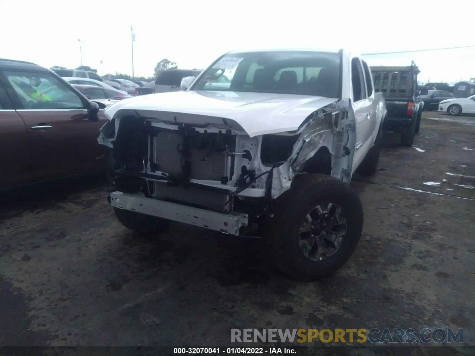 6 Photograph of a damaged car 3TMDZ5BN7MM121026 TOYOTA TACOMA 4WD 2021