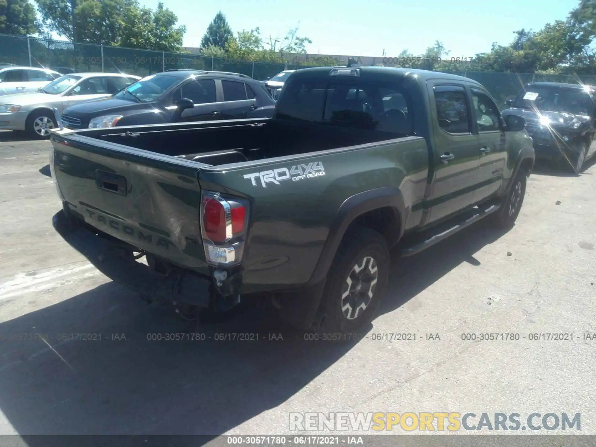 4 Photograph of a damaged car 3TMDZ5BN8MM100640 TOYOTA TACOMA 4WD 2021