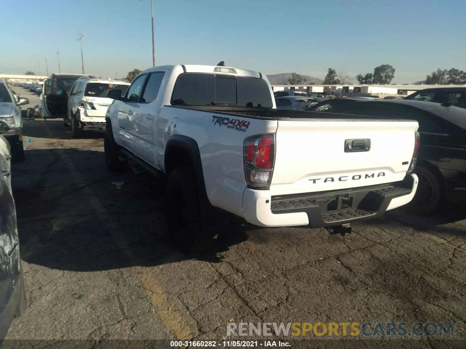 3 Photograph of a damaged car 3TMDZ5BN9MM101120 TOYOTA TACOMA 4WD 2021