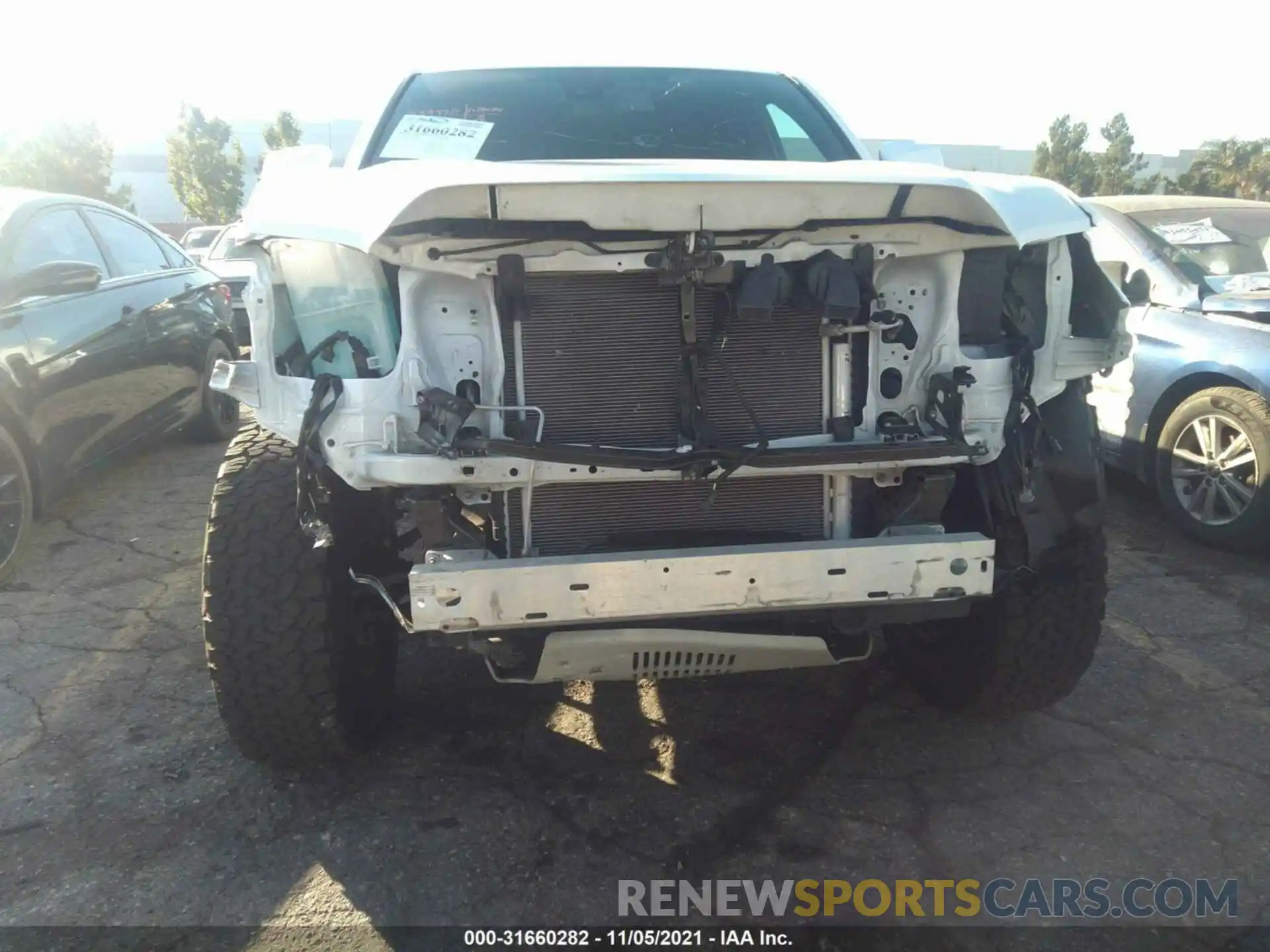 6 Photograph of a damaged car 3TMDZ5BN9MM101120 TOYOTA TACOMA 4WD 2021