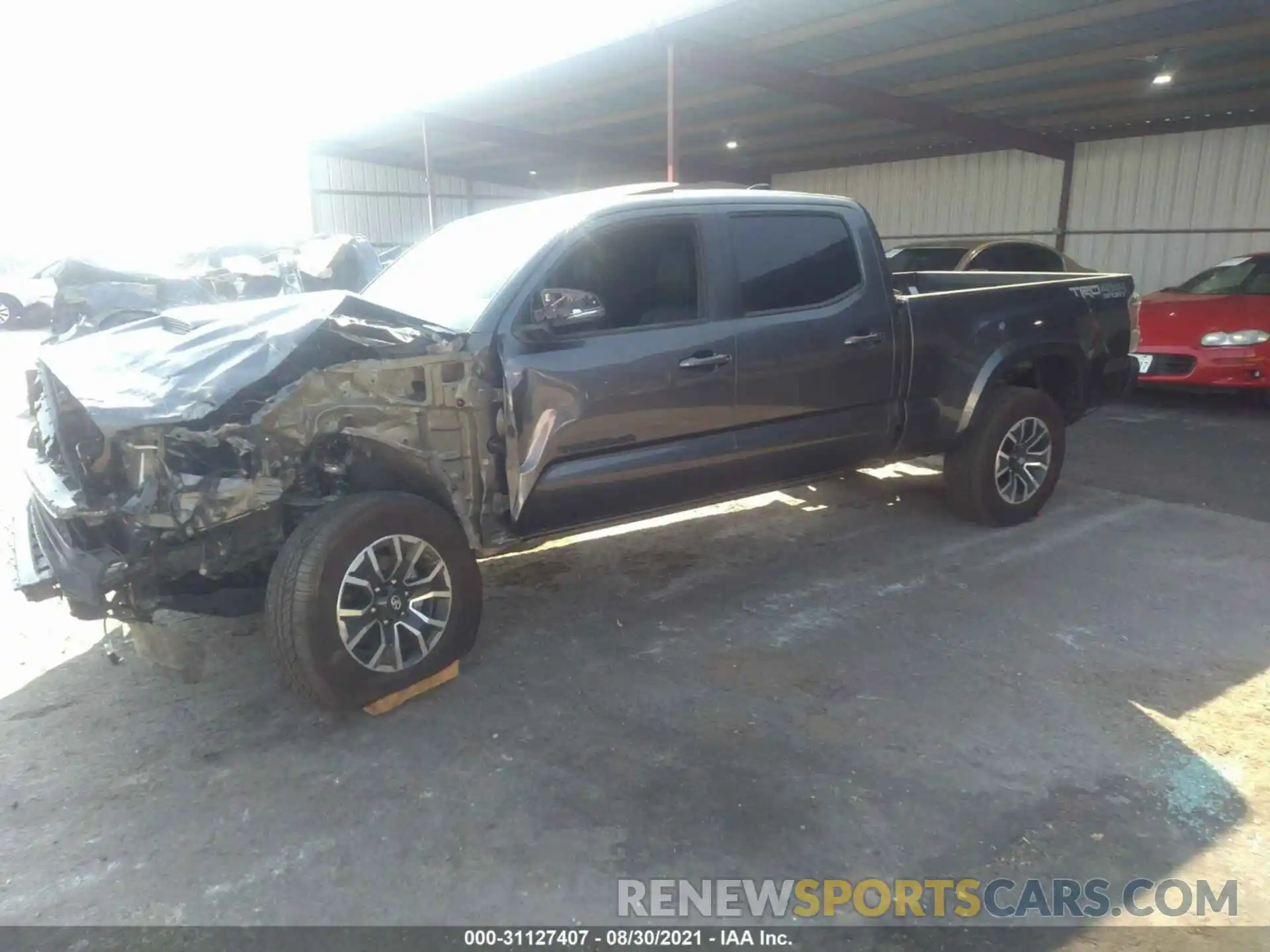 2 Photograph of a damaged car 3TMDZ5BN9MM106897 TOYOTA TACOMA 4WD 2021