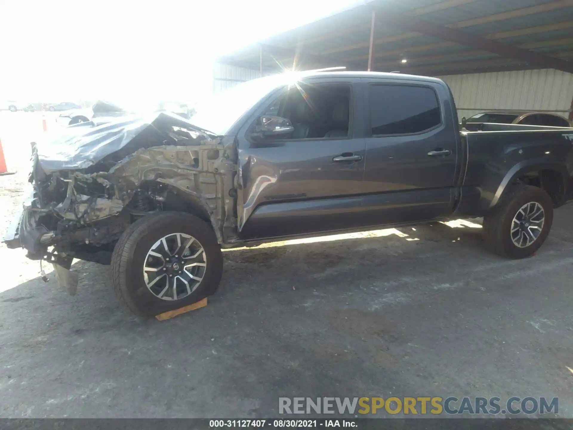 6 Photograph of a damaged car 3TMDZ5BN9MM106897 TOYOTA TACOMA 4WD 2021