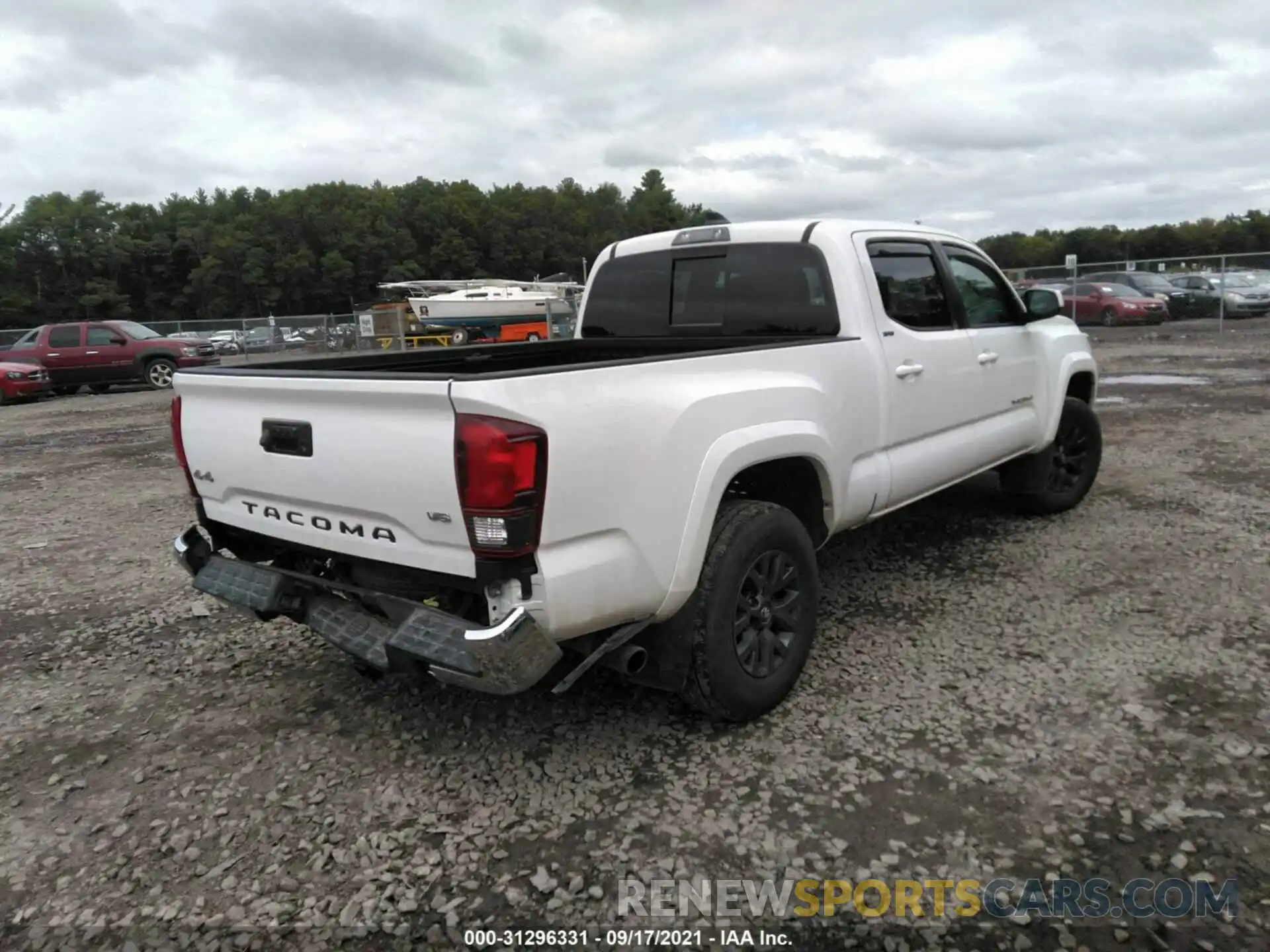 4 Photograph of a damaged car 3TMDZ5BNXMM099653 TOYOTA TACOMA 4WD 2021