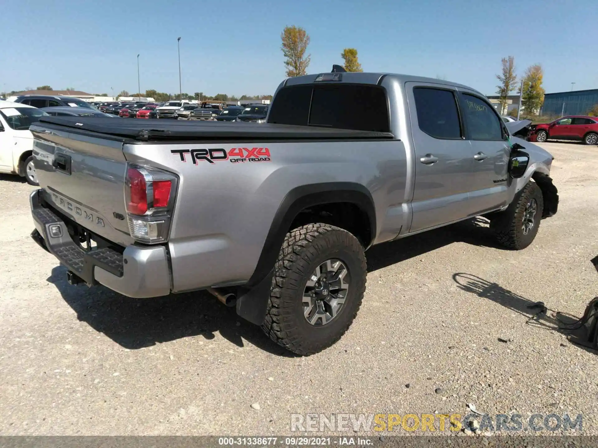 4 Photograph of a damaged car 3TMDZ5BNXMM100624 TOYOTA TACOMA 4WD 2021